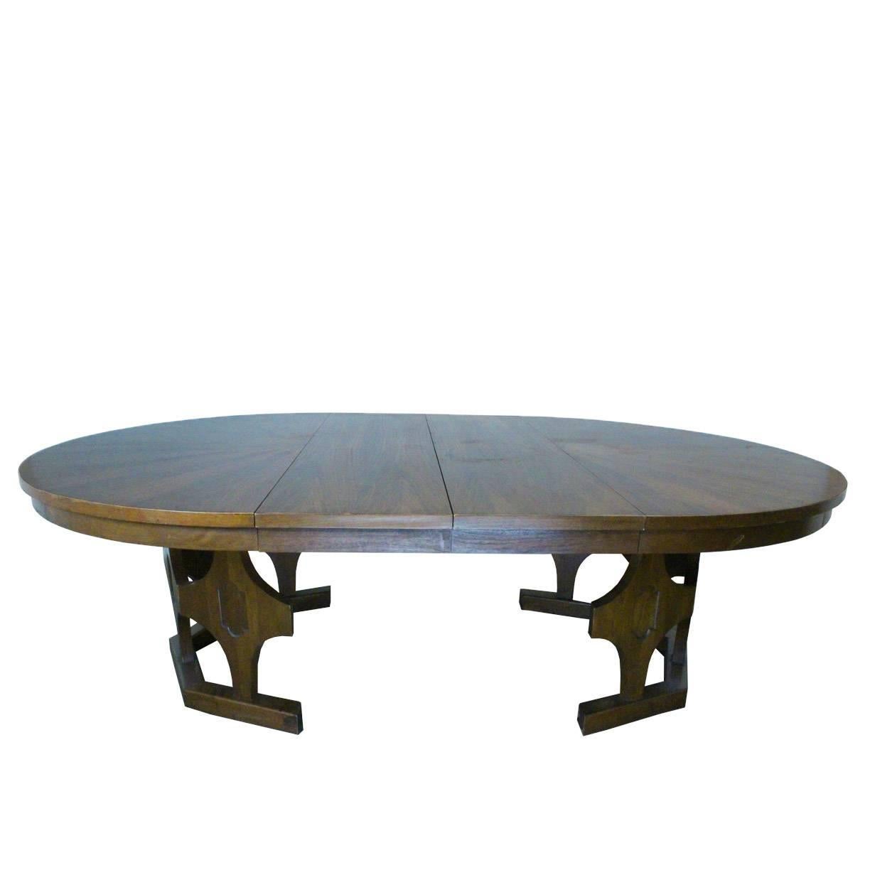 1960s Mid-Century Expandable Round Walnut Dining Table. 

dimensions: 60