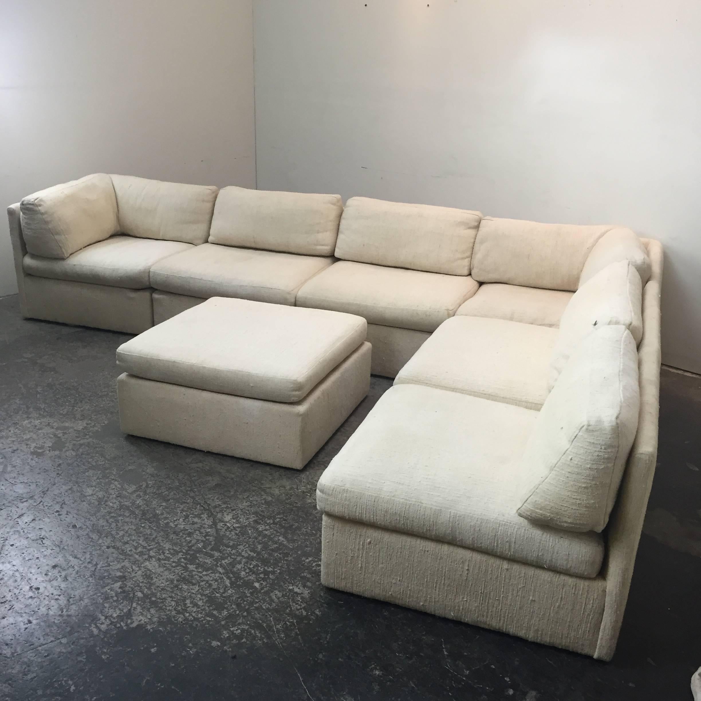 Great form, large and comfortable, this modular Milo Baughman sectional in it's original Haitian cotton fabric can be reconfigured to suit any room. Reupholstery recommended.

Dimensions: 133