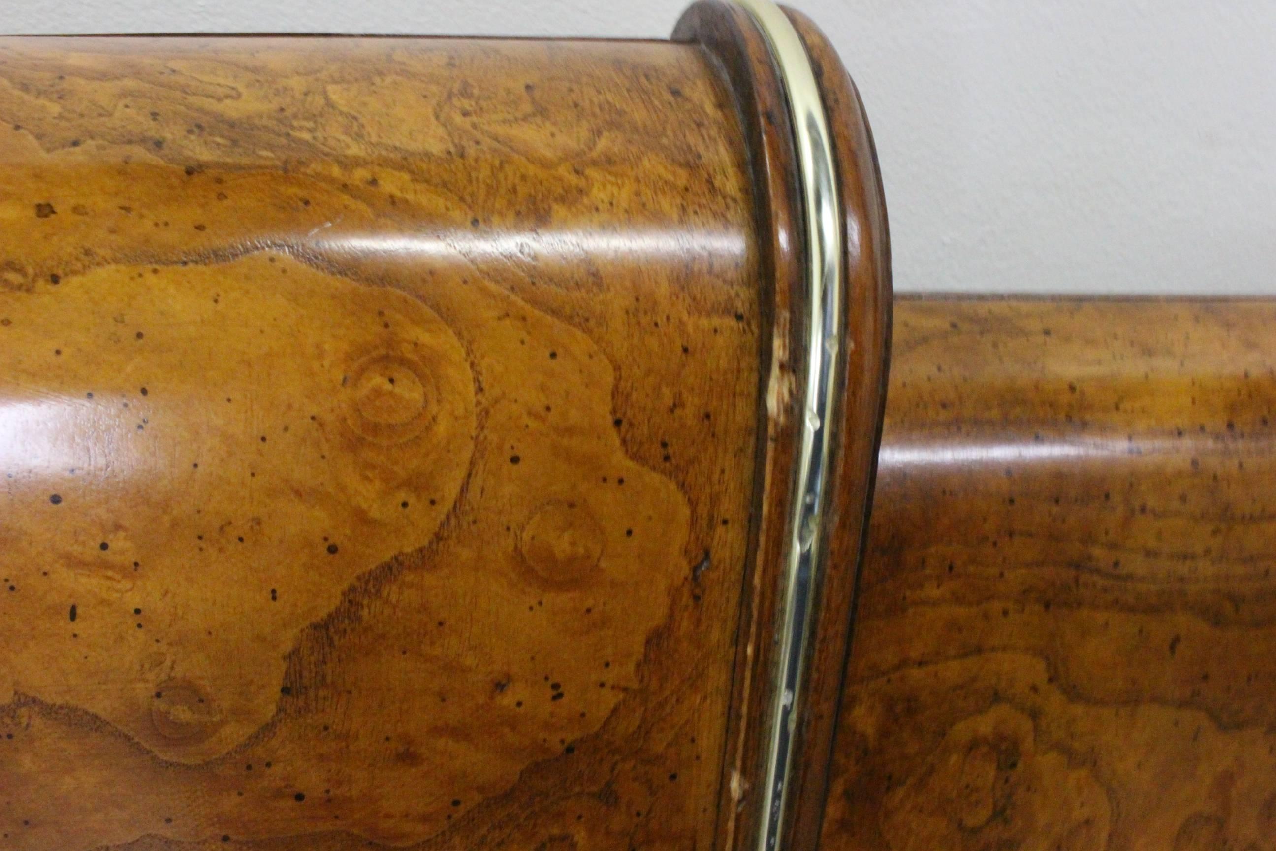 Burl wood deco headboard which is in good condition, with some slight damage to brass lining detail. 

dimensions: 78.5