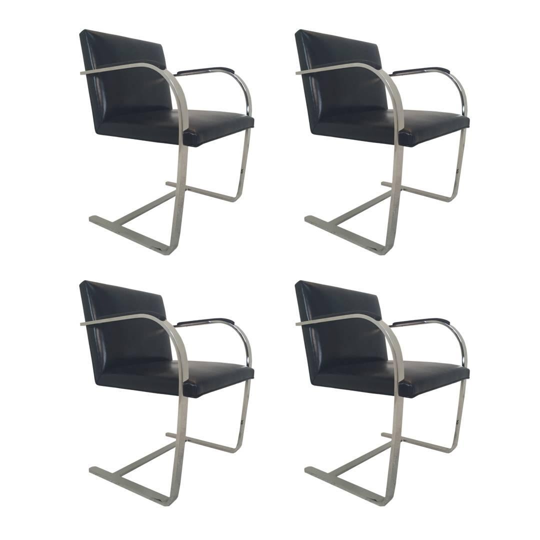 Four Stainless Brno Chairs with Sharkskin Arm Pads