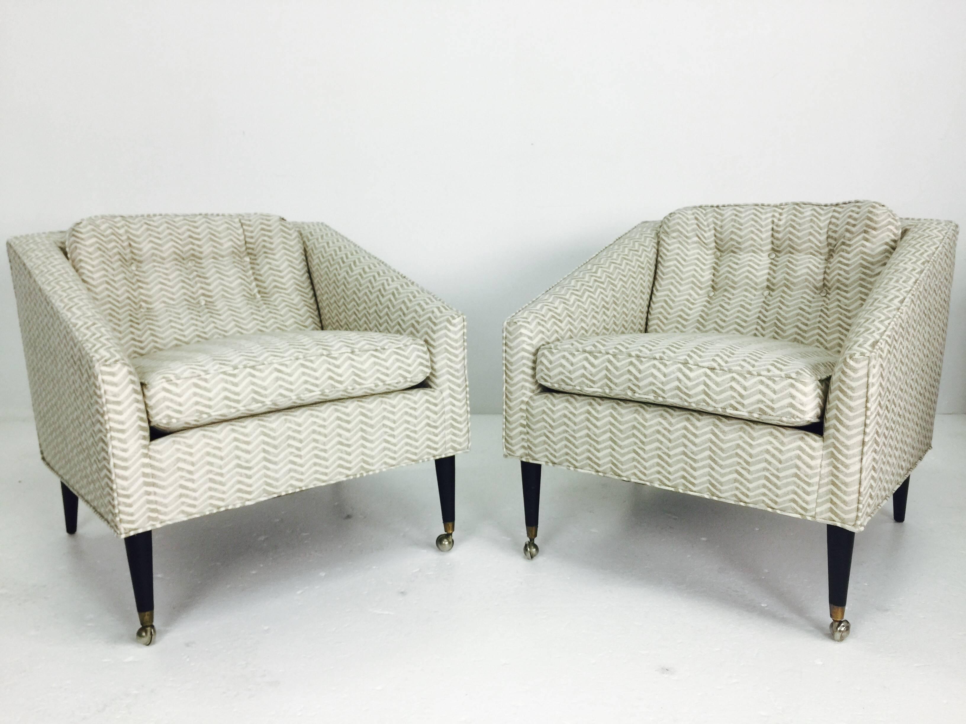 Newly reupholstered with herringbone pattern fabric and espresso leg finish.

Dimensions: 27.5