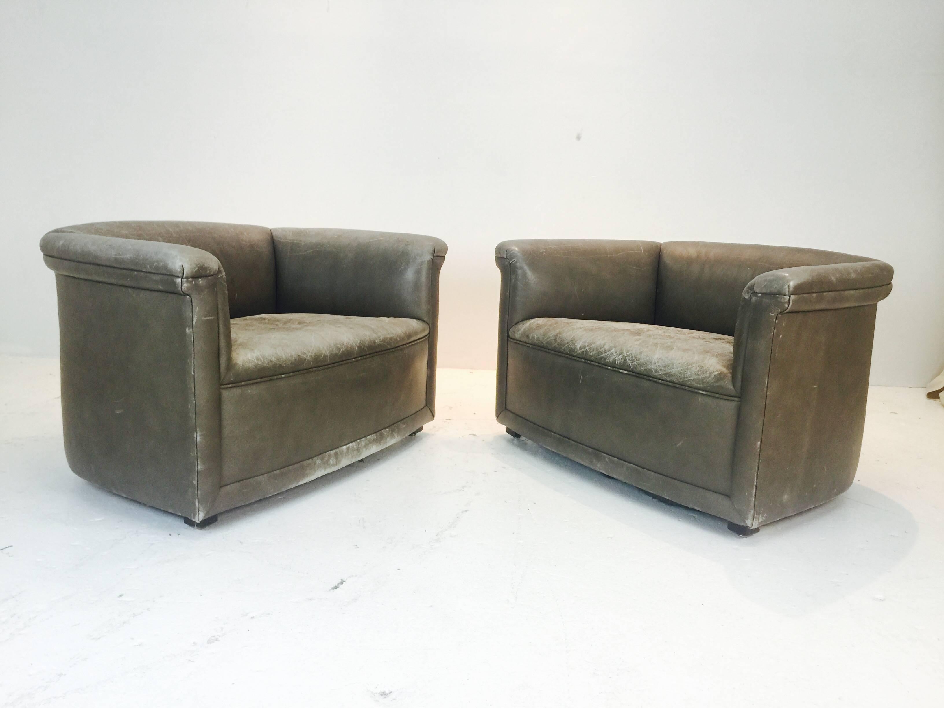 Pair Patina Leather Club Chairs by Ward Bennett. The chairs have a graceful form and needs reupholstery.

dimension:39