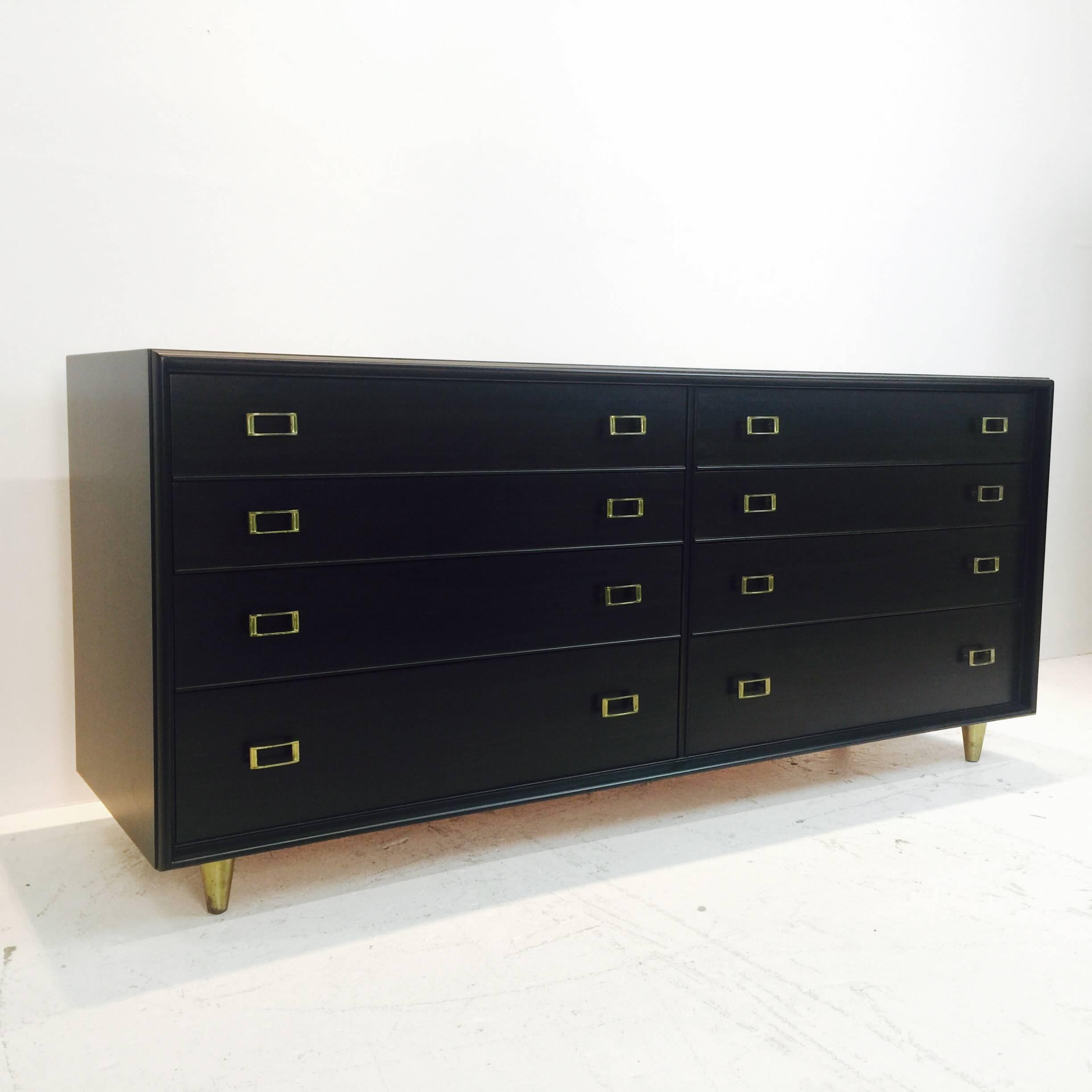 Eight-drawer dresser or credenza by Paul Frankl for Johnson Furniture with ebonized finish.

Dimensions: 72