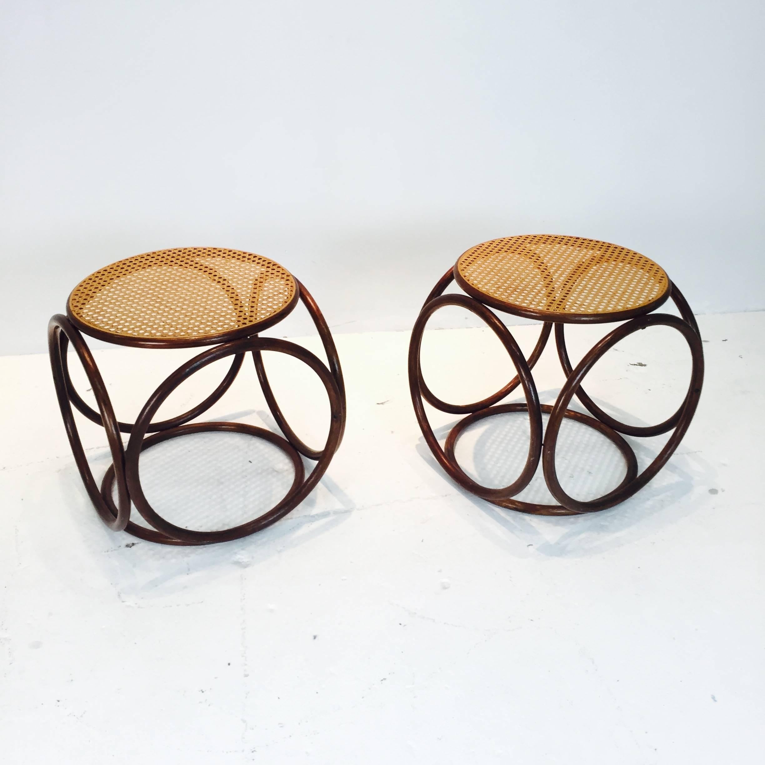 Pair of cane bentwood Thonet stools or ottomans.

Measures: 17