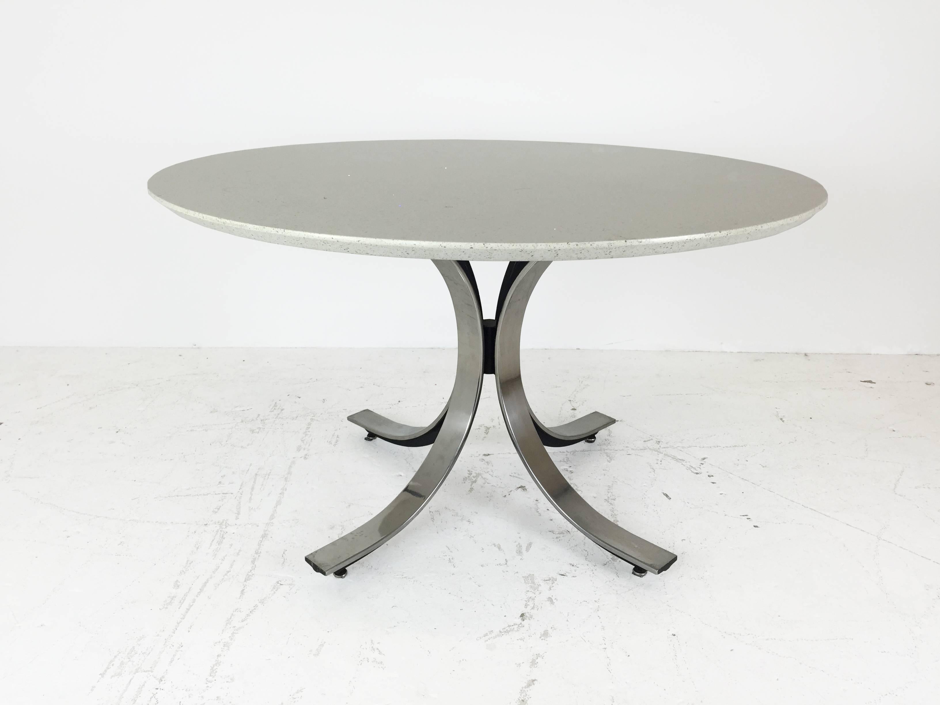 Four-legged chrome base round dining table with white quartz top by Borsani. Dimension: 48" dia x 28.5" T.
1" think quartz top.