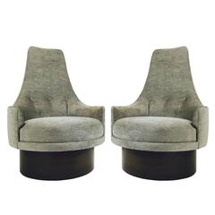 High back swivel chairs by Adrian Pearsall