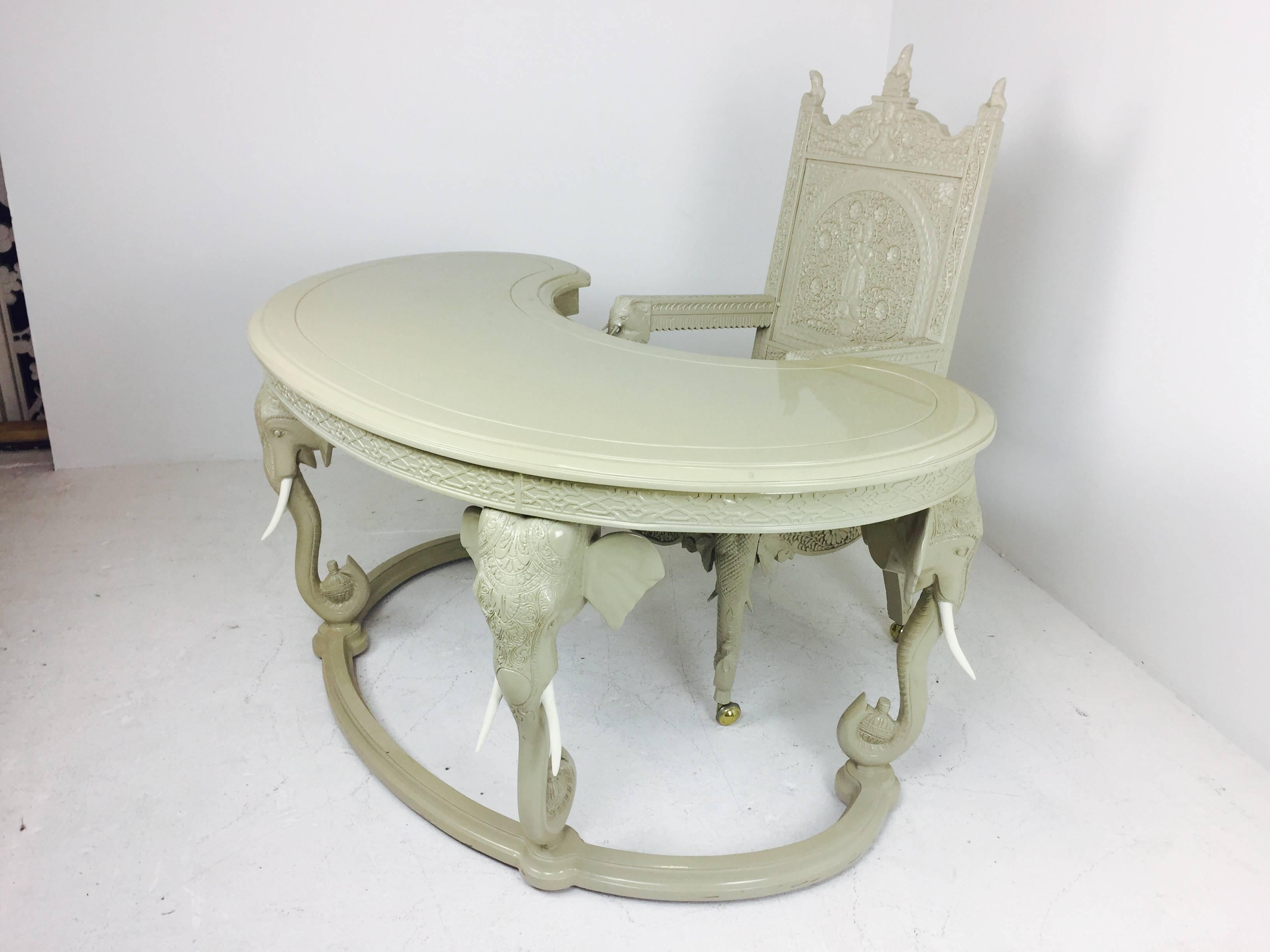 Hollywood Regency lacquered elephant desk and chair. The desk and chair are lacquered in similar soft taupe colors. Refinishing is recommended.

Dimensions: 60