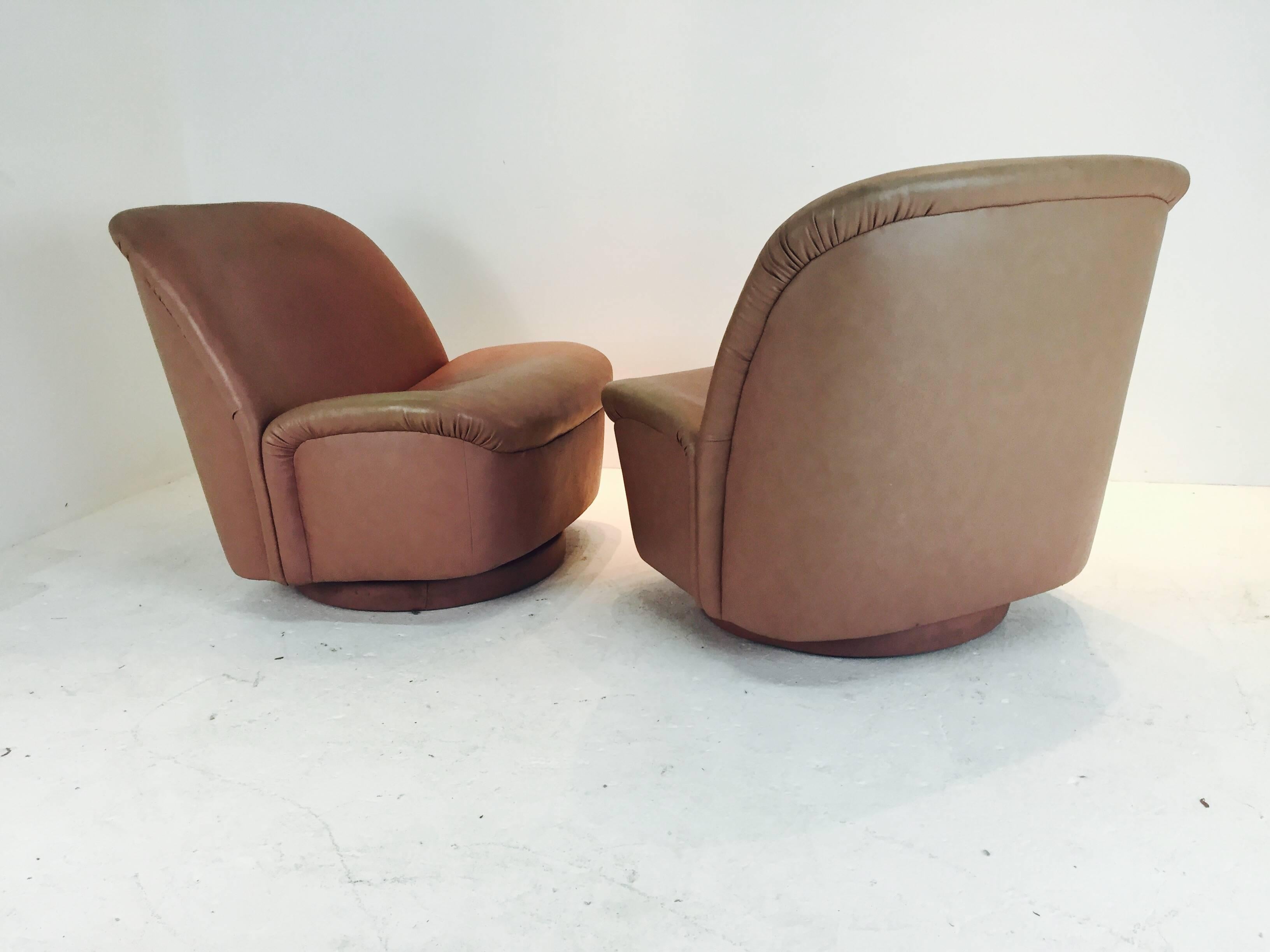 Pair of Blush Leather Swivel and Tilt Chairs by Directional 1