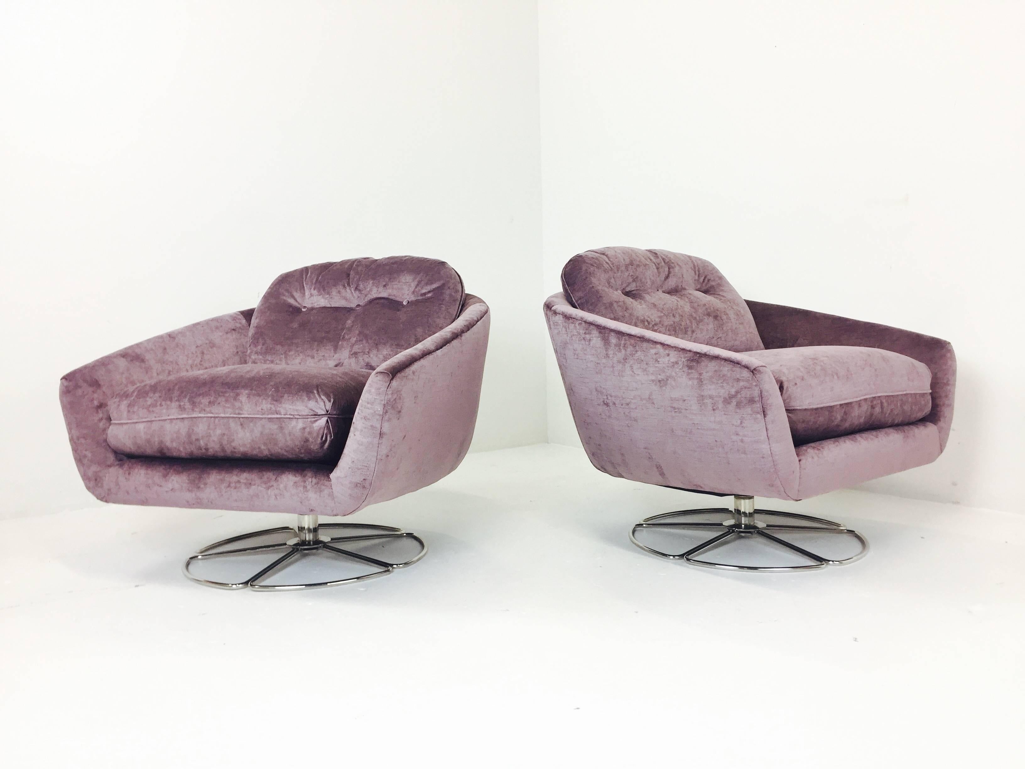 Newly upholstered swivel chairs with chrome lotus bases by Selig.

Dimensions: 34