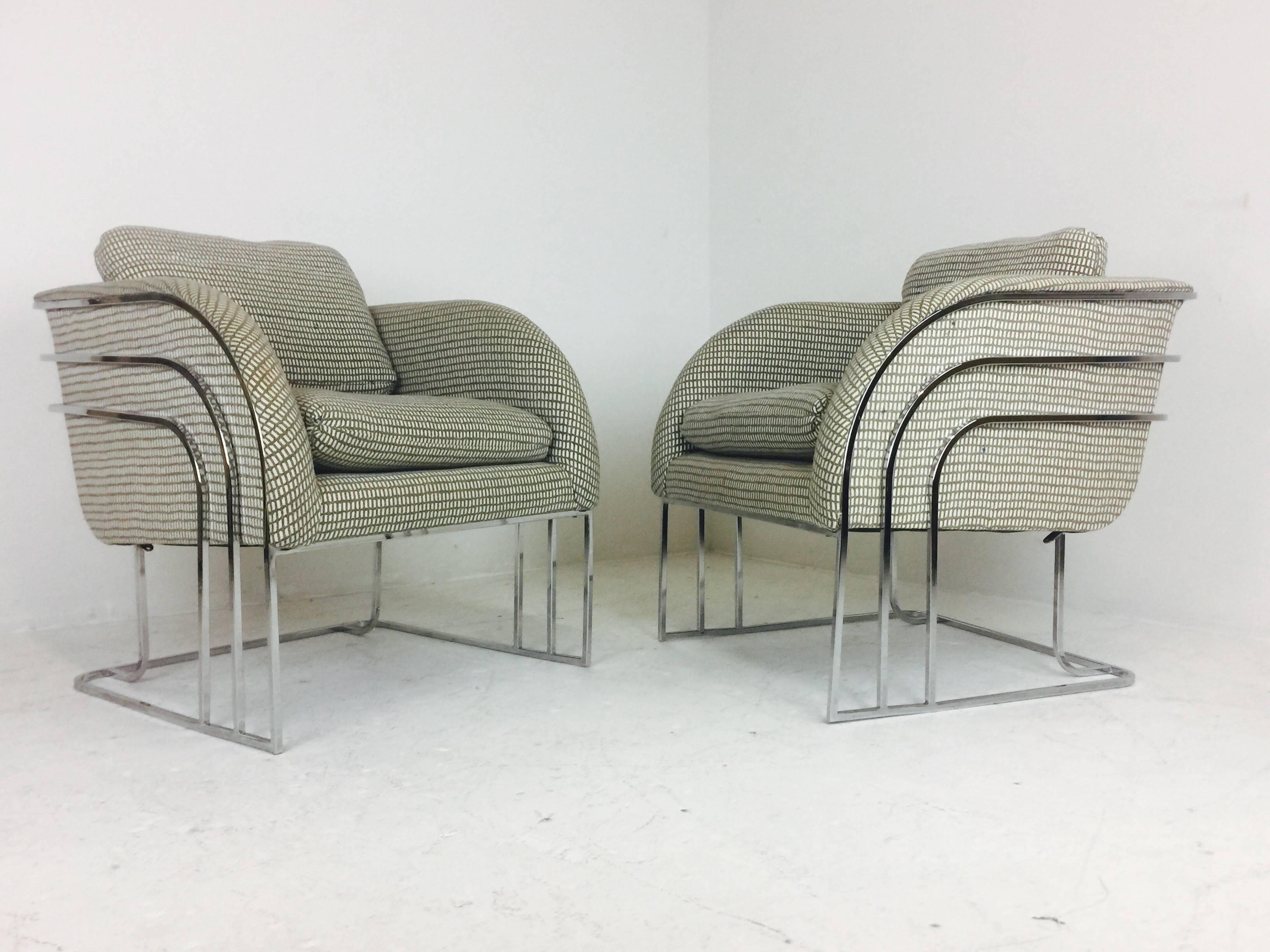 Pair of graceful chrome framed Deco style chairs by Milo Baughman. Chrome is in good vintage condition with minimal wear and the upholstery has a few snags in the seat area. New upholstery is suggested, circa 1970s.

Dimensions: 27