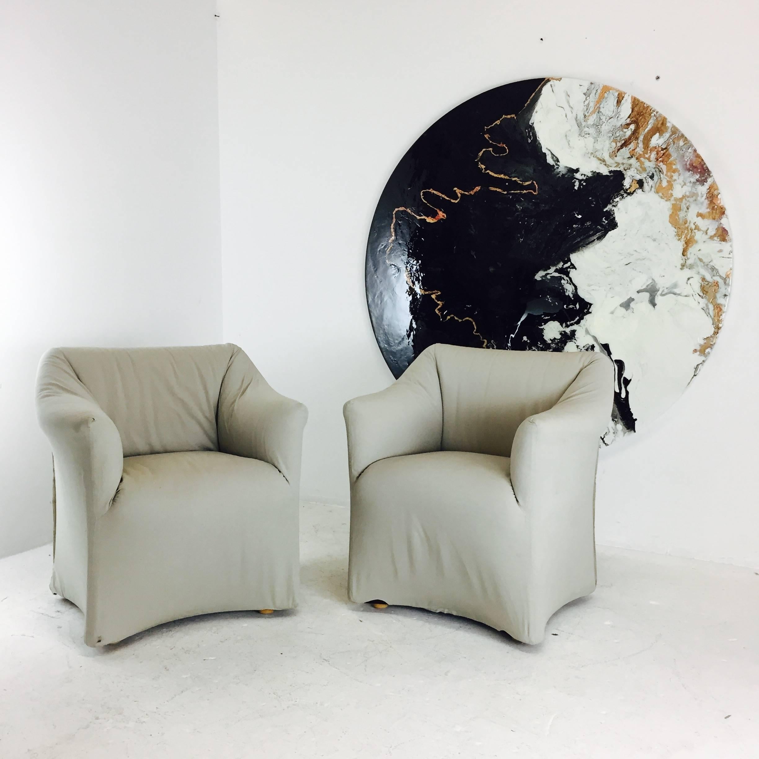 Pair of comfortable Tentazione lounge chairs by Marion Bellini for Cassina. Tailored and sculptural. Upholstery is in good vintage condition, circa 1970s.

Dimensions: 30