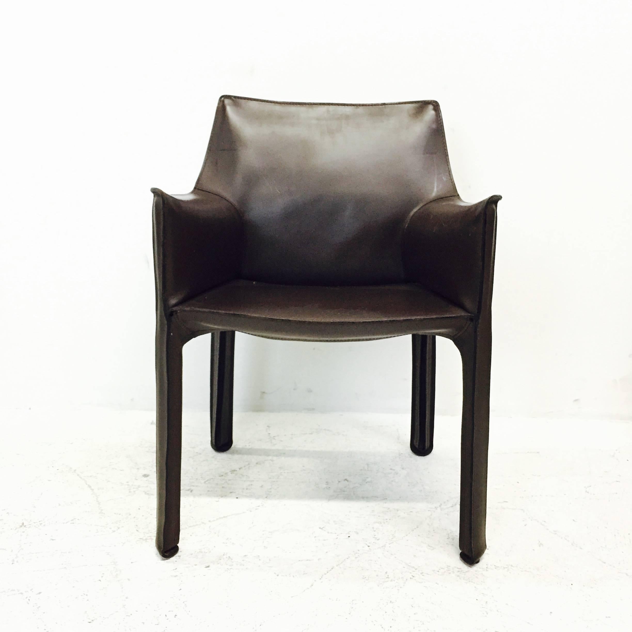 Set of 15 Marion Bellini cab dining armchairs for Cassina in espresso brown. There is visible wear on the leather that gives a wonderful patina, circa 1980s

dimensions: 22.5" W x 19" D x 32" T
seat height 18".