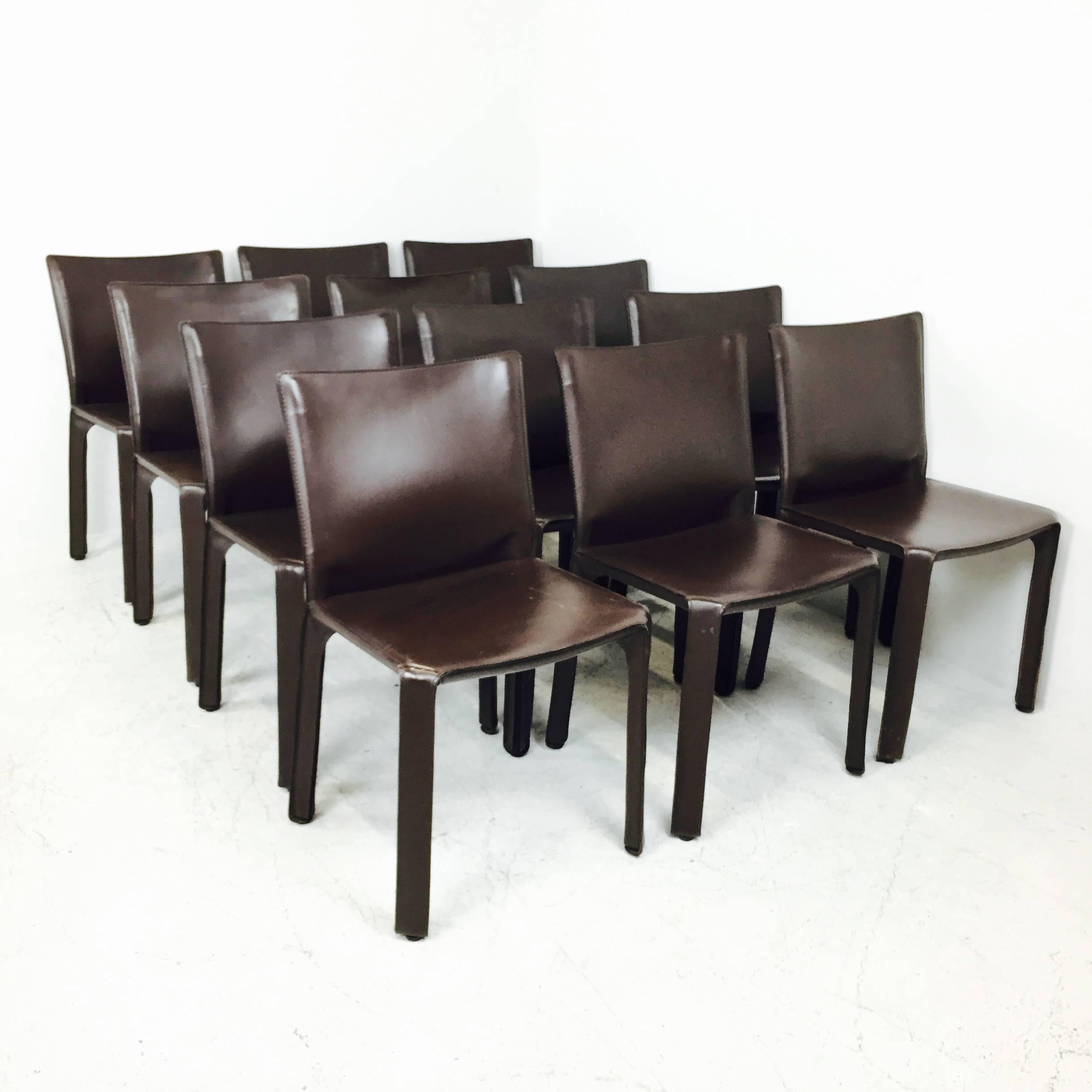 Marion Bellini cab chairs for Cassina in espresso brown. There is visible wear on the leather, circa 1980s.
 3 chairs available. Contact for more information on condition of chairs.

Dimensions: 19