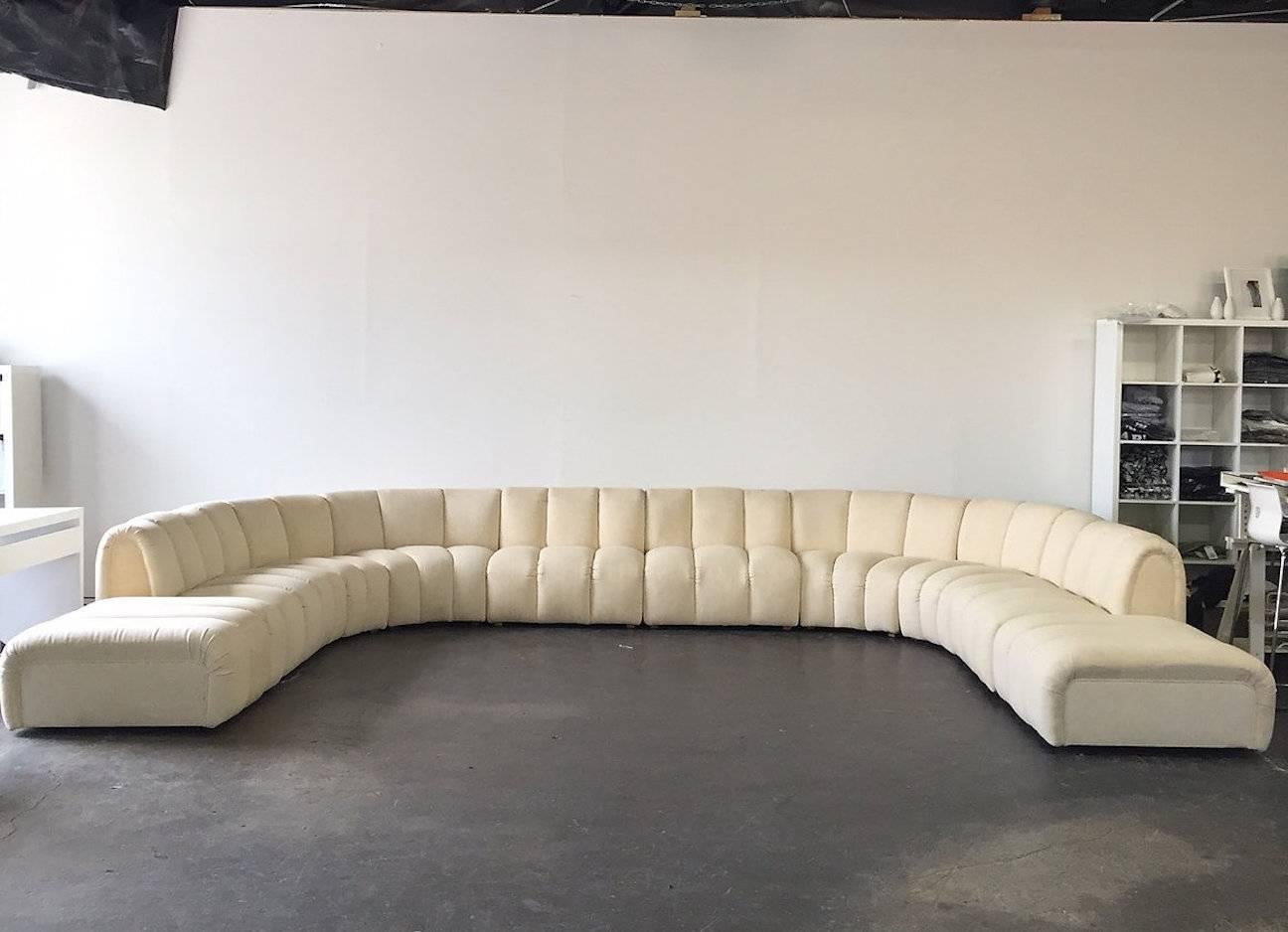 Ten-piece monumental channel back modular sofa. Upholstery is in good vintage condition with no visible tears but does show its age and new upholstery is needed, circa 1970s.

Dimensions: 205