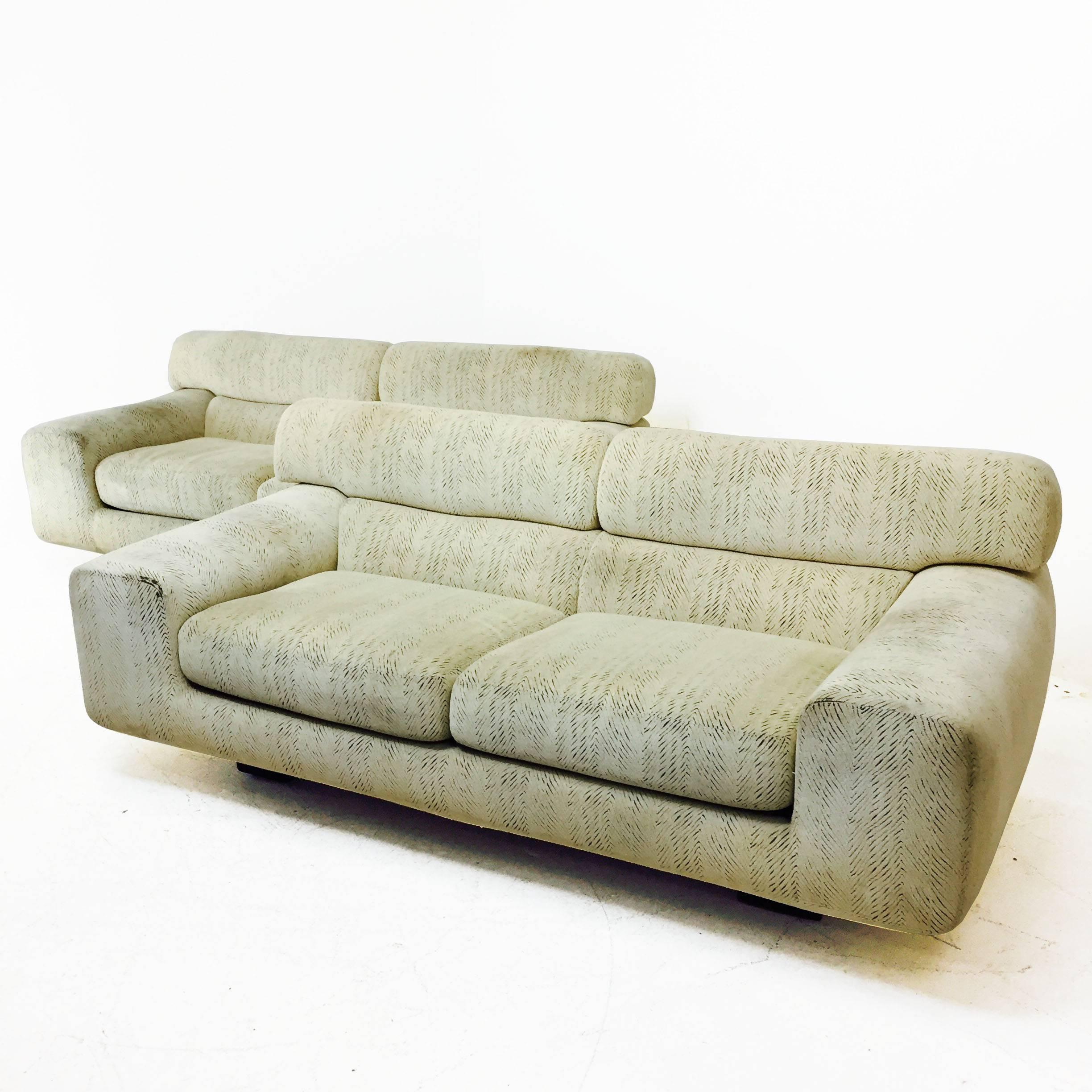 Modern loveseat in the style of Vladimir Kagan. The upholstery is in good vintage condition with some wear and soiling around arm section. 

(only one love seats available)

Love seats sold individually.

Dimensions: 70" W x 35" D x