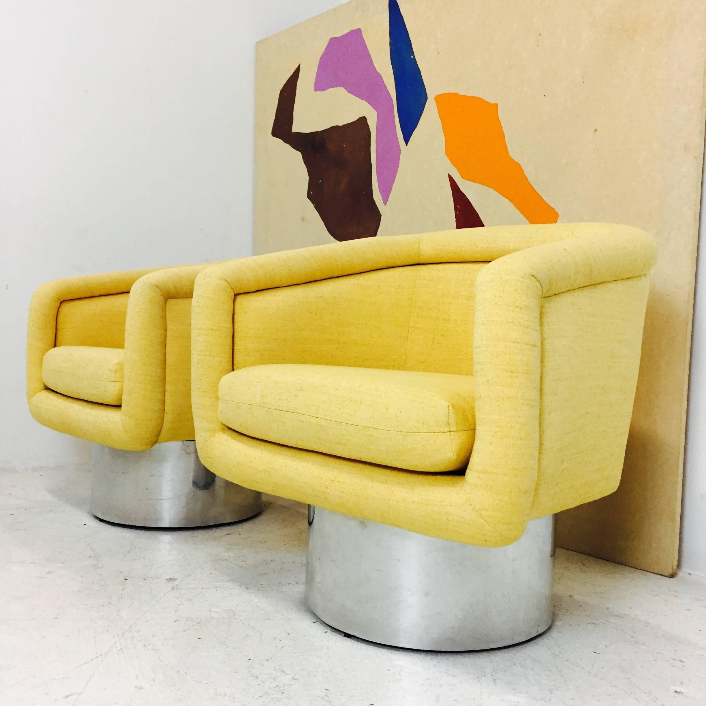 Cheerful and elegant upholstered swivel chairs with plinth base designed by Leon Rosen for Pace collection. Upholstery is in good condition with minimal soiling, circa 1970s
contact for more information on condition.

Dimensions: 29" W x