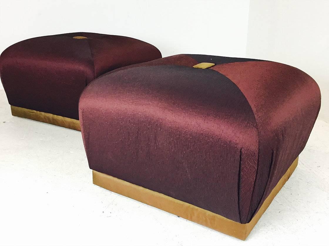 Pair of merlot colored Poufs. Plinth base is upholstered, circa 1980s

dimensions: 28" W x 28" D x 16" T.