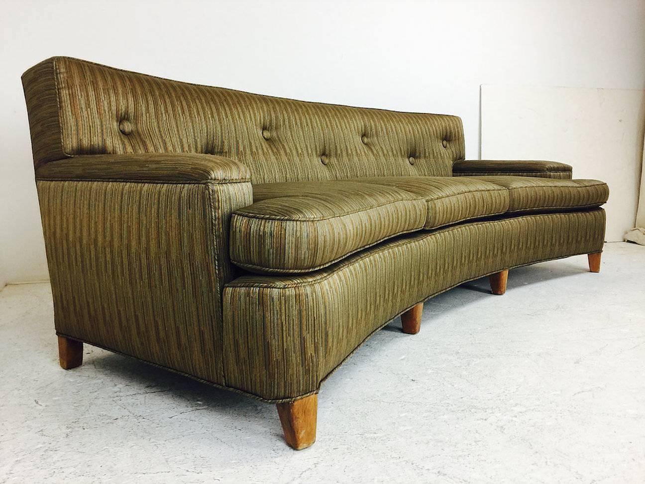 Mid-Century Modern Dunbar style sofa with a slight curved front. Upholstery is in good as found condition, circa 1960s.

Dimensions:
91" W X 36" D X 32" T
seat height 18".