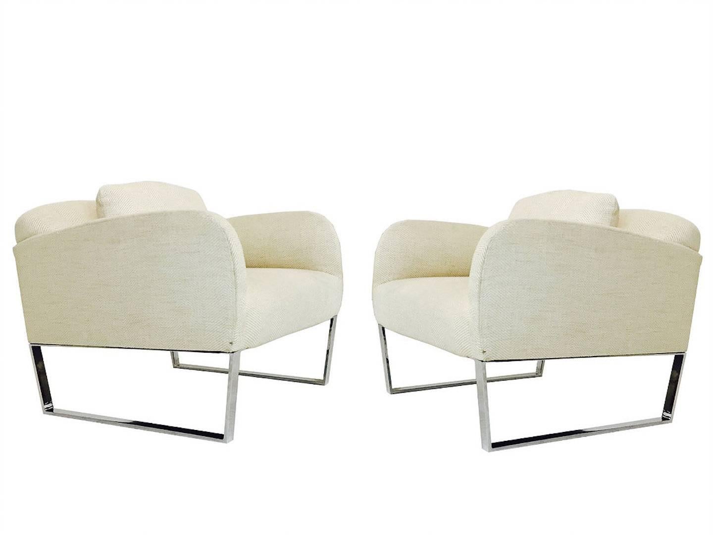 Pair of chrome Donghia Focal deco style lounge chairs in the style of Milo Baughman created by Angelo Donghia. Chairs are in good vintage condition with minimal visible wear, circa 1980s

Dimensions: 30.5