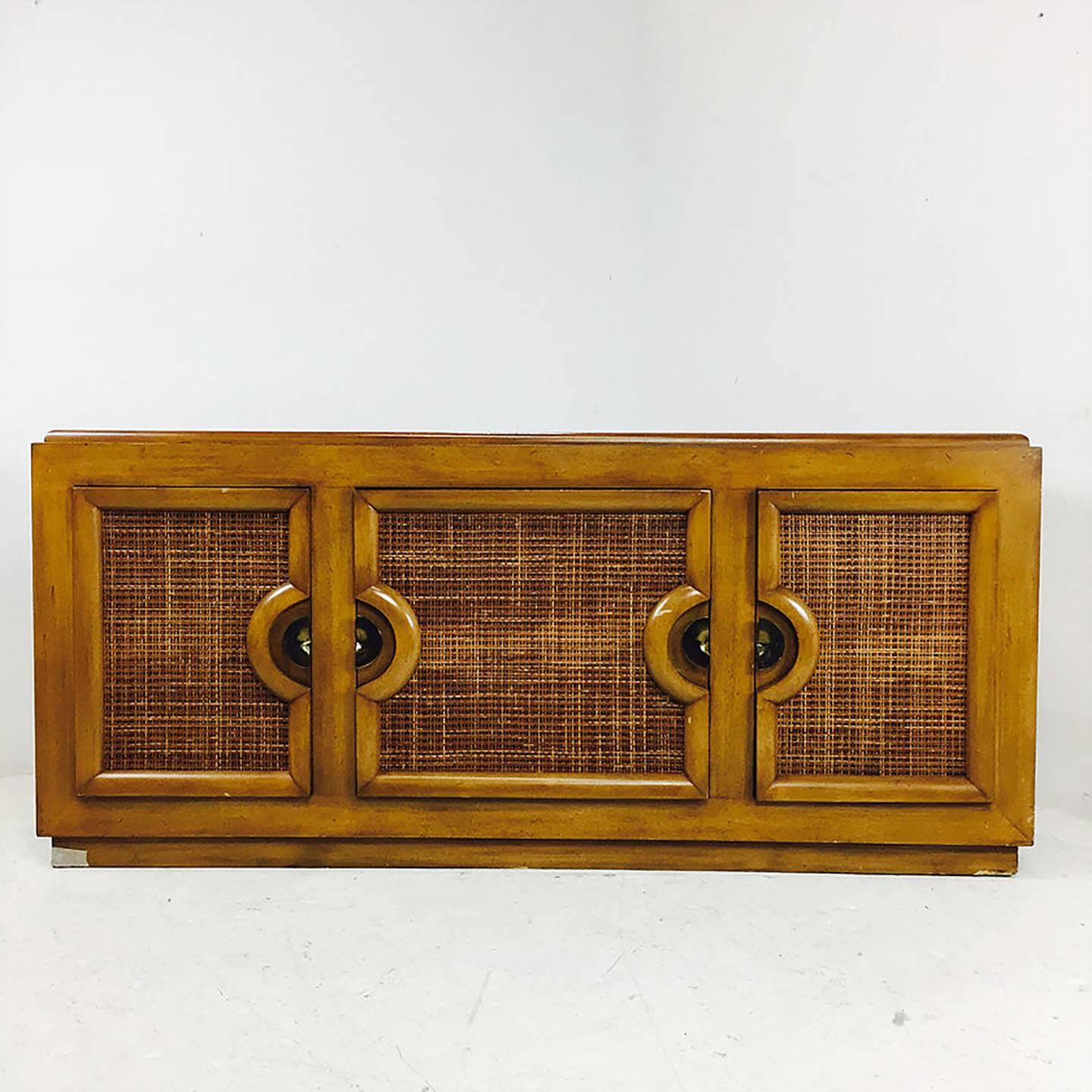 MCM three-door credenza for Brown Stewartstown Furniture Company. Refinishing is recommended for this pieces, circa 1960s

Dimensions: 72" wide x 19" deep x 32.5" tall.