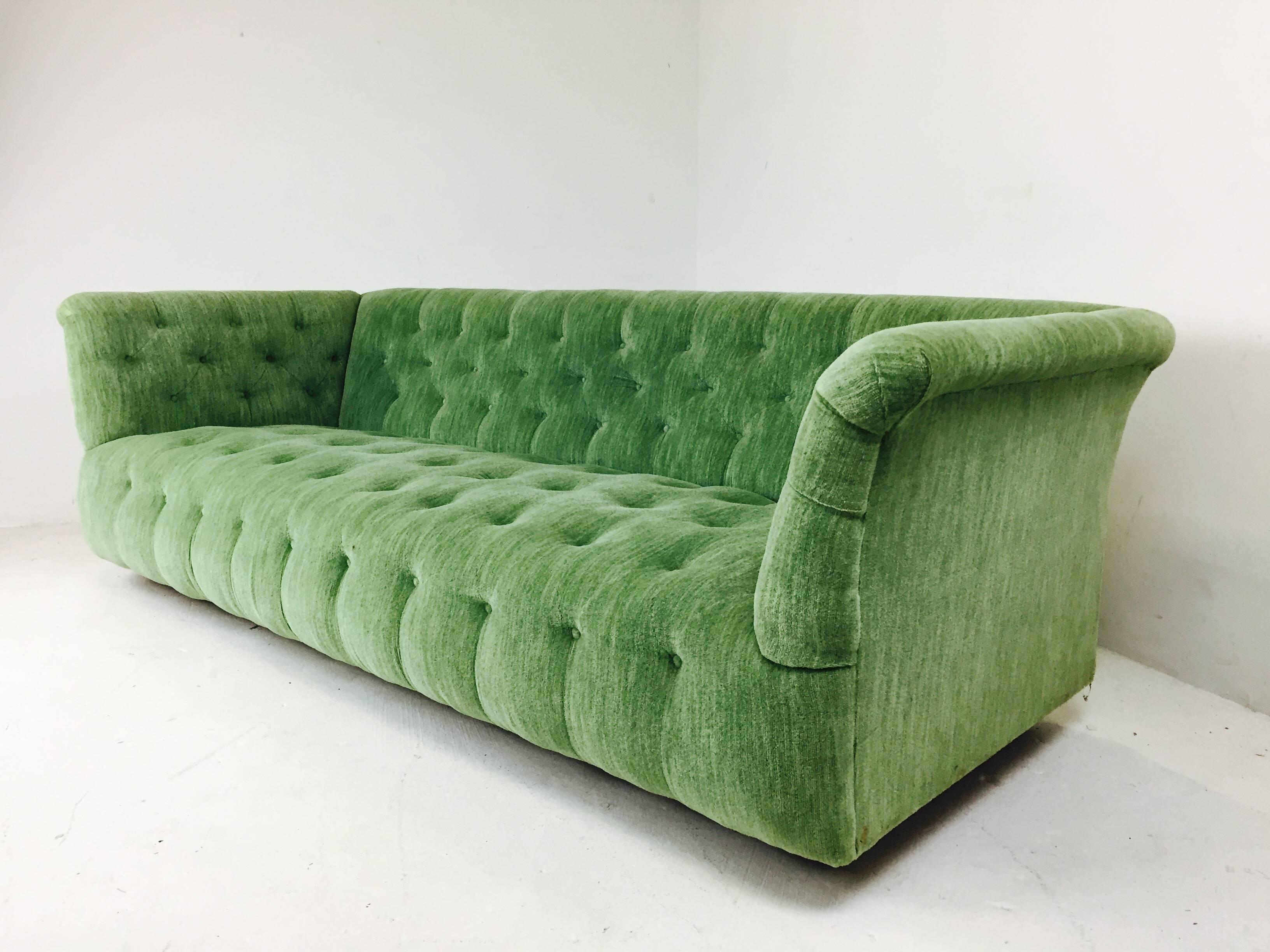 Milo Baughman Chesterfield style tufted sofa with wood plinth base. In good vintage condition, circa 1980s

Dimension: 84