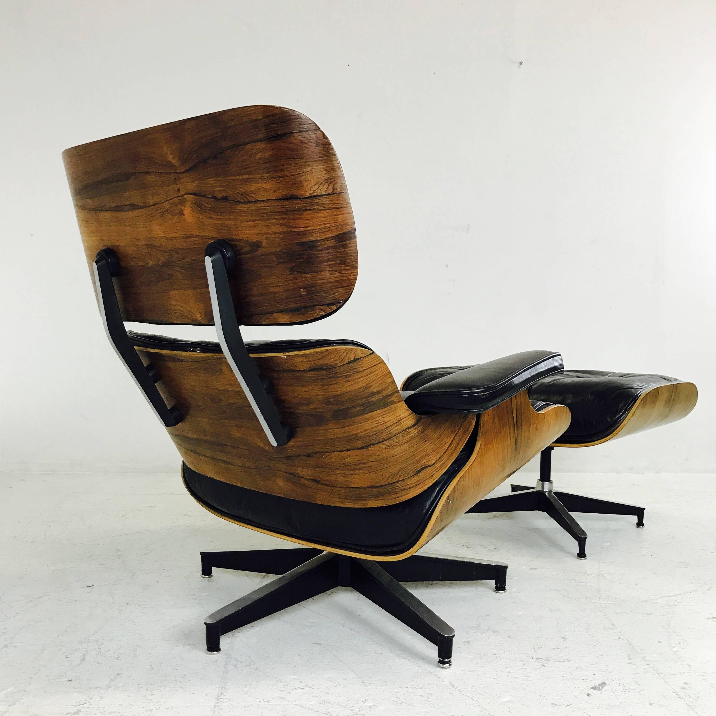 Rosewood Eames lounge chair and ottoman. Chair and ottoman are in great vintage condition with minor nicks in the wood finish.

Dimensions: 33" W x 33" D x 32" T
26" W x 21.5" D x 17" T.