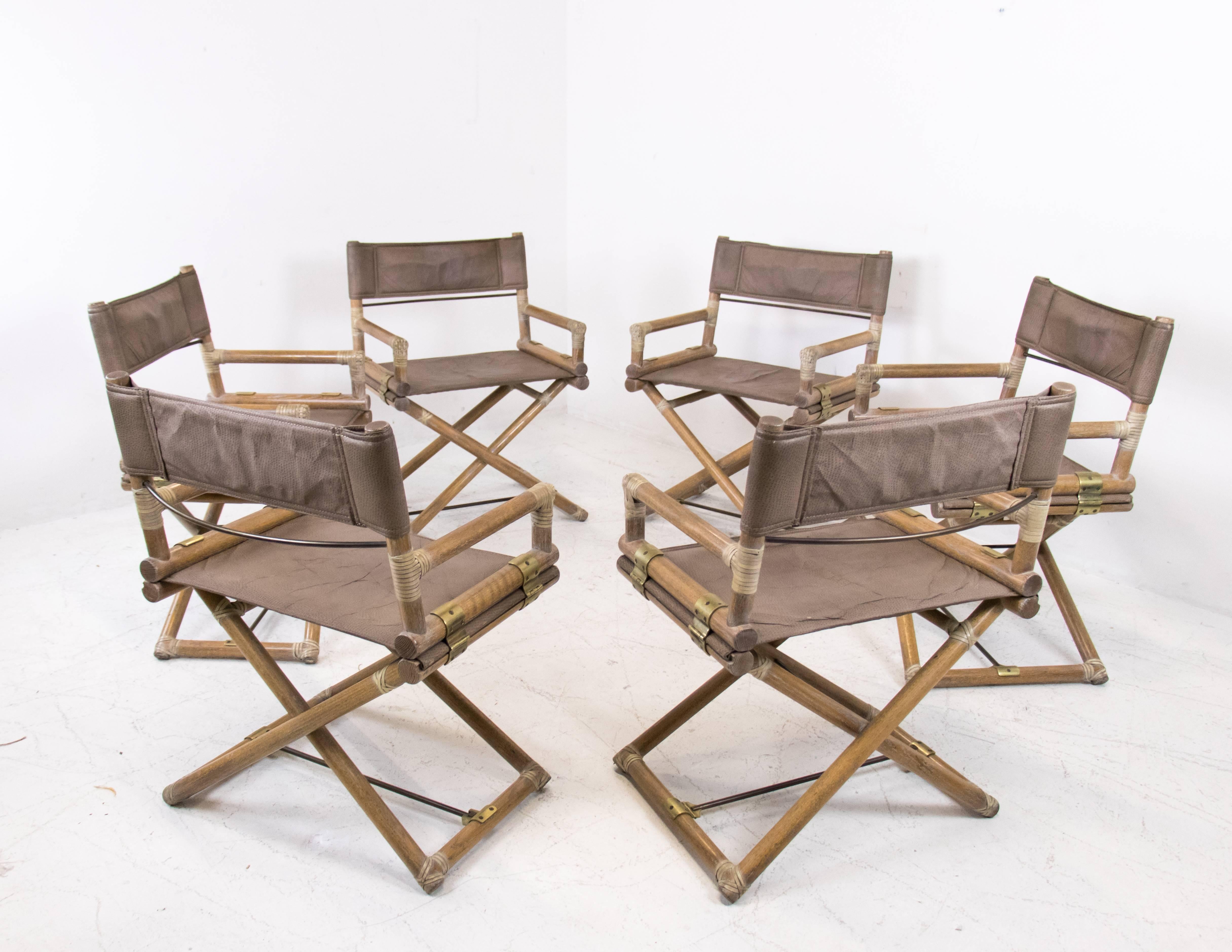 Set of six McGuire bamboo campaign chairs with pigskin upholstery. These chairs are in good vintage condition with signs of wear due to age and use.

Dimensions: 23" W x 22" D x 33.5" T
Seat height 18".