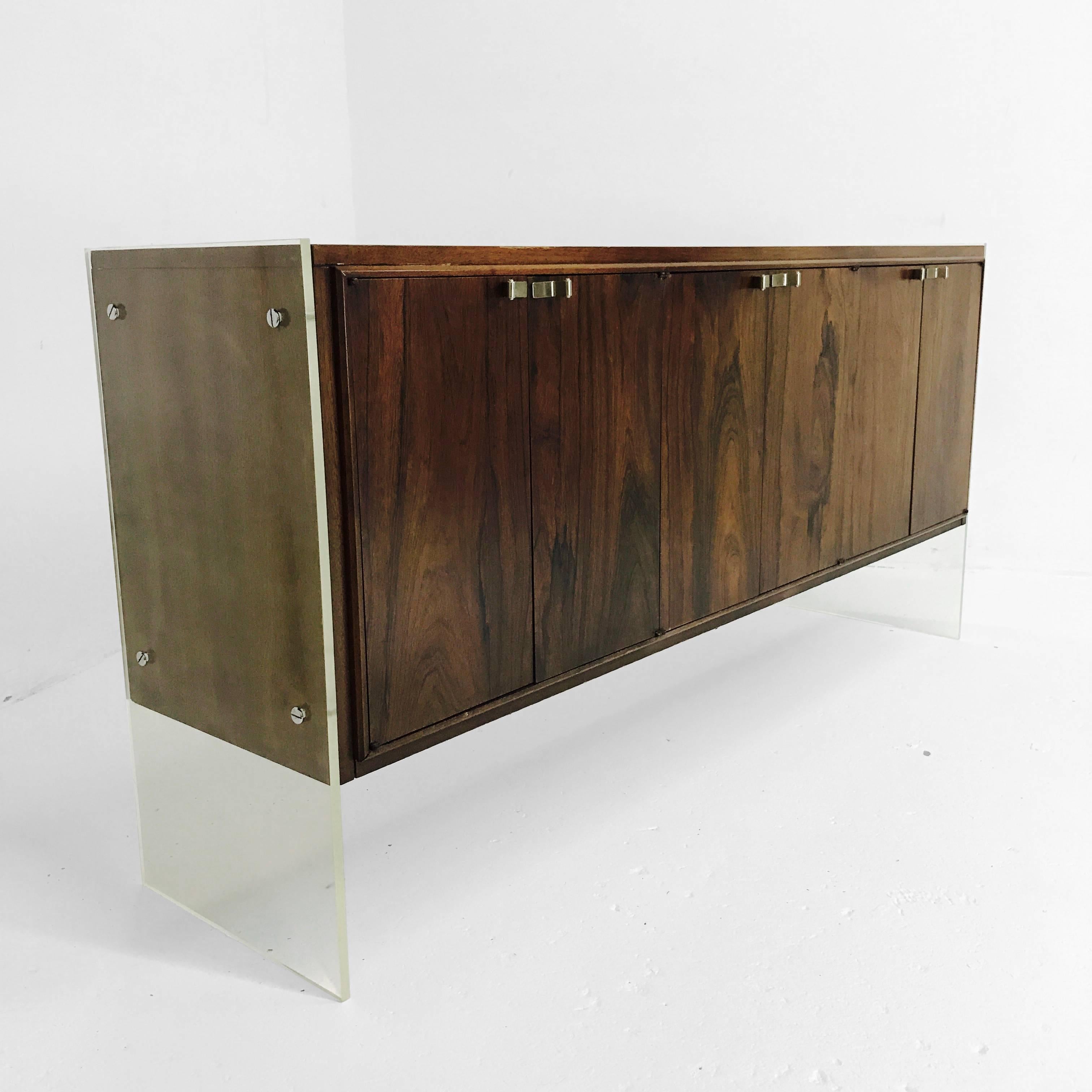 Credenza with Lucite slab sides and a solid wood construction by Flair. Credenza needs some TLC, circa 1960s

Dimensions: 66