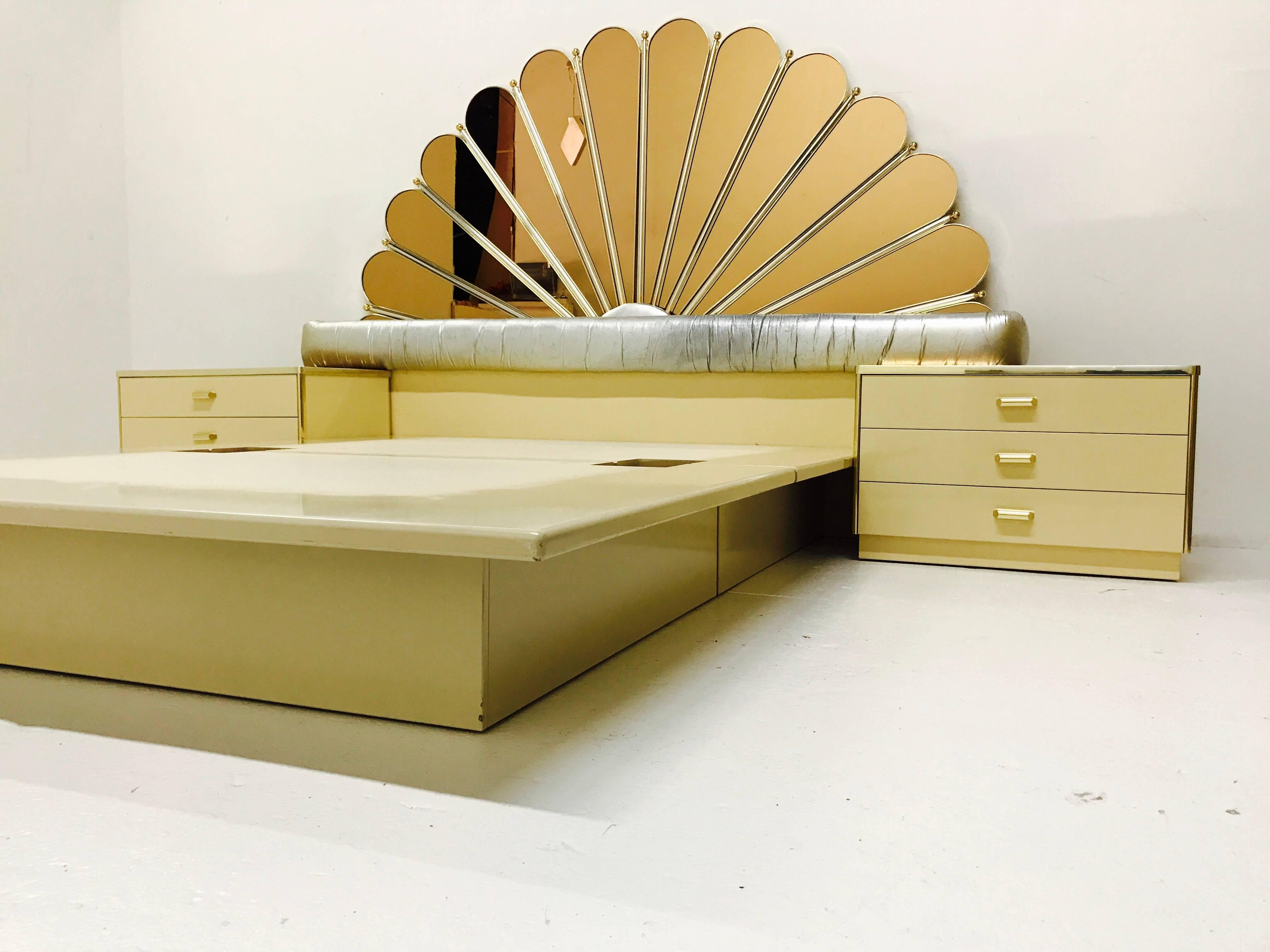Bronze mirrored queen platform bed and nightstands by Rougier. Headboard has a 10