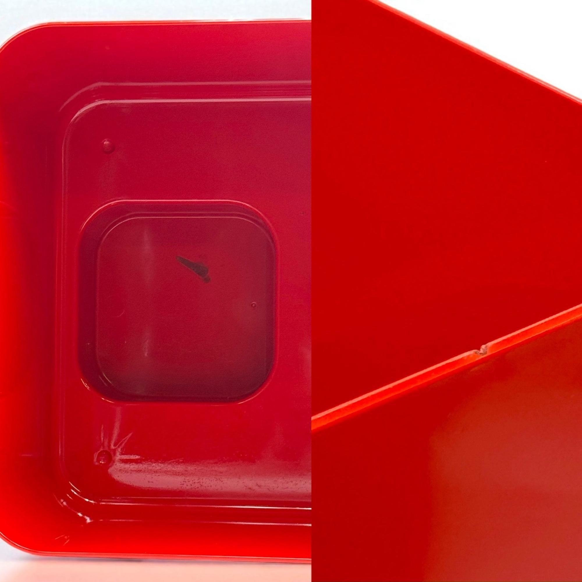 Offered here is a rare set of two Dime trolleys, designed by Marcello Siard and manufactured by Collezioni Longato in Italy during the 1970s. Crafted in vivid red Novodur® plastic, these cubic storage carts embody the essence of Italian Space Age