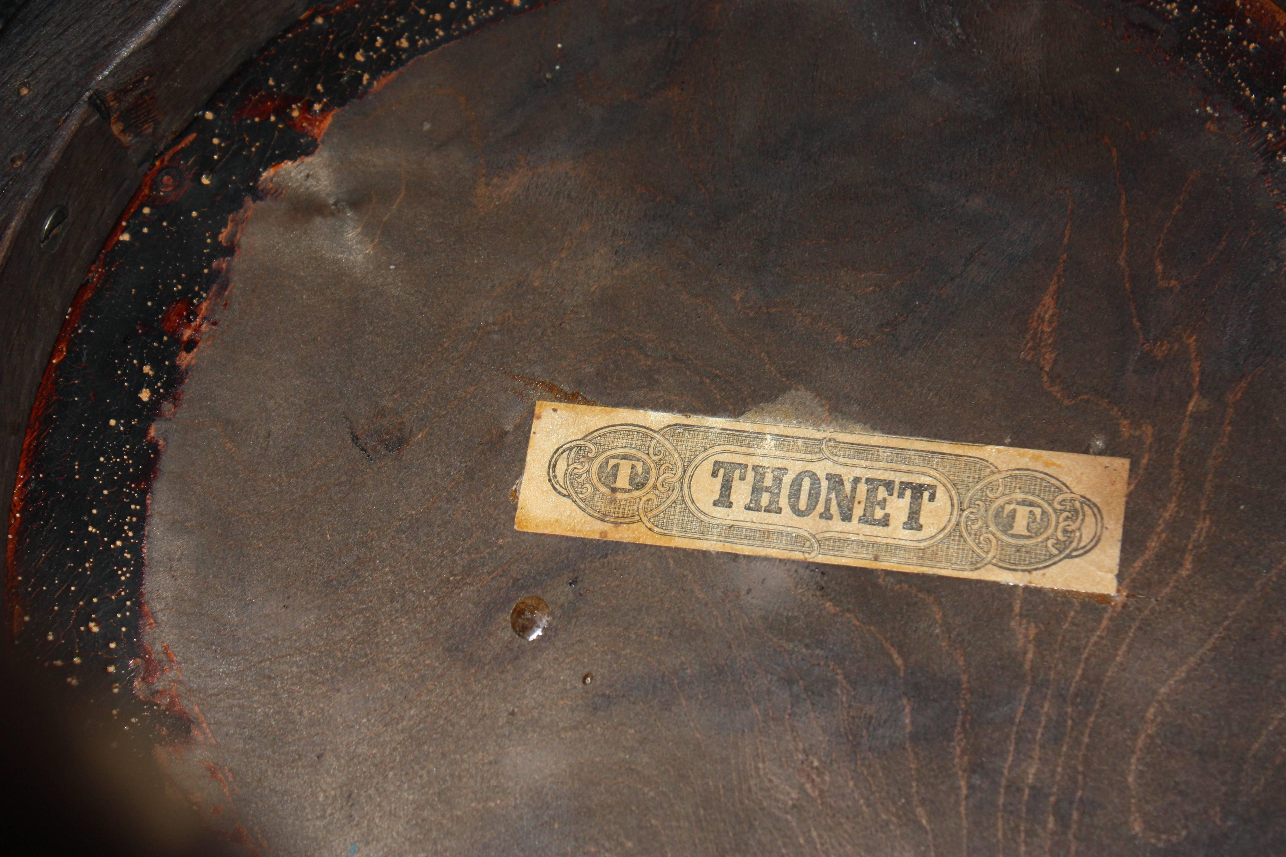 A Thonet pedestal with the original paper label.  Ebonized beech wood.