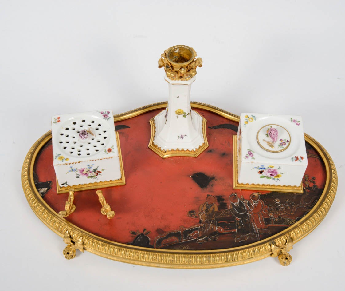 Rare inkwel -3 pieces in porcelain of Sèvres  on a red  laque base, surronded with gilded bronze