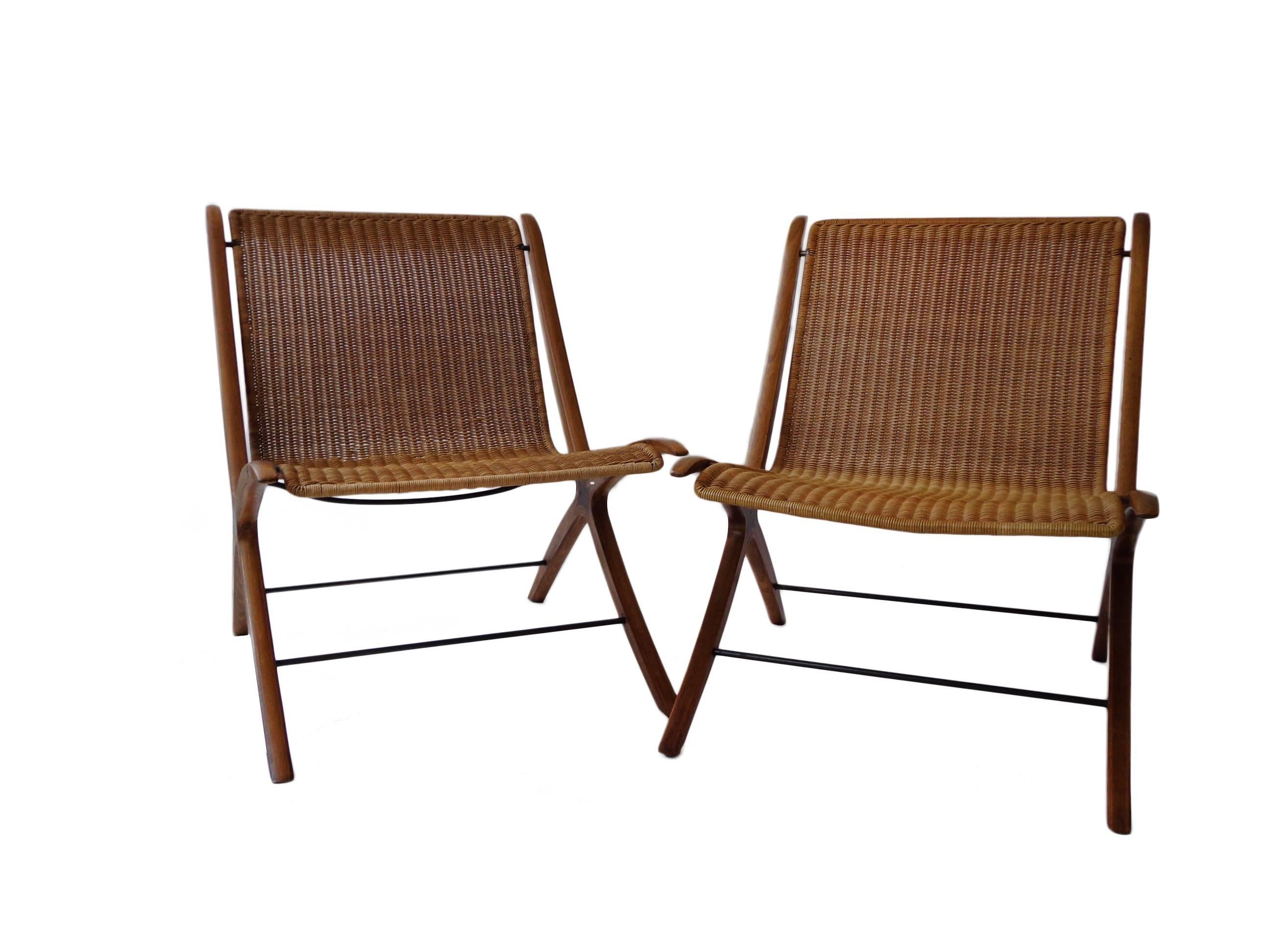 Offerd by Zitzo, Amsterdam: A pair of teak-cane lounge Chair by Peter Hvidt & Orla Mølgaard Nielsen for Fritz Hansen. Model 6103 or 