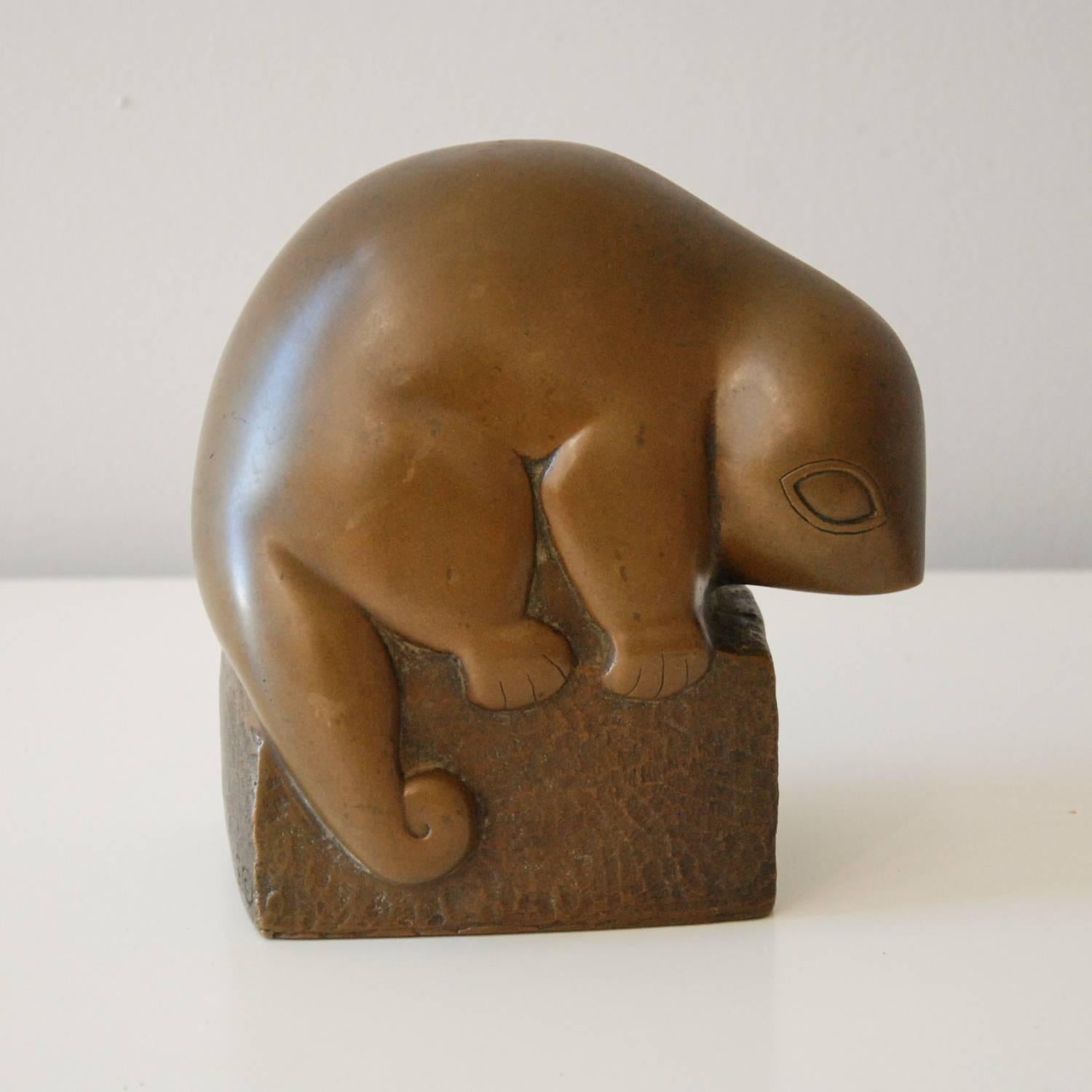 A very stylized copper over plaster sculpture of a lemur by noted sculptor Marian Weisberg. The work is signed on the side of the base. Original patina.