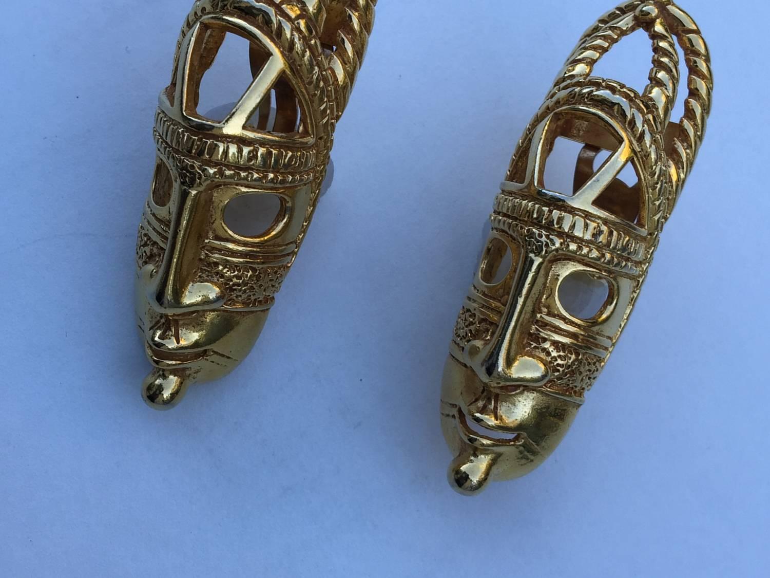 Metal Pair of Dominique Aurientis Tribal Mask Goldtone Earrings, circa 1980, France For Sale