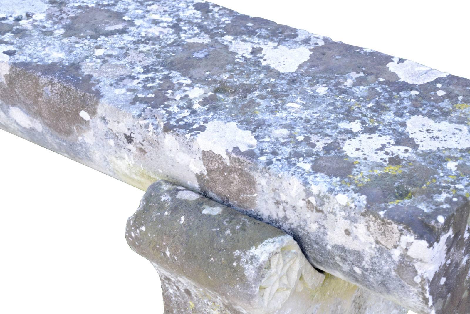 Dated from the 19th century, large stone bench with monolith sitting resting on two feet lyre decorated with five-pointed stars. Small losses on the feet.