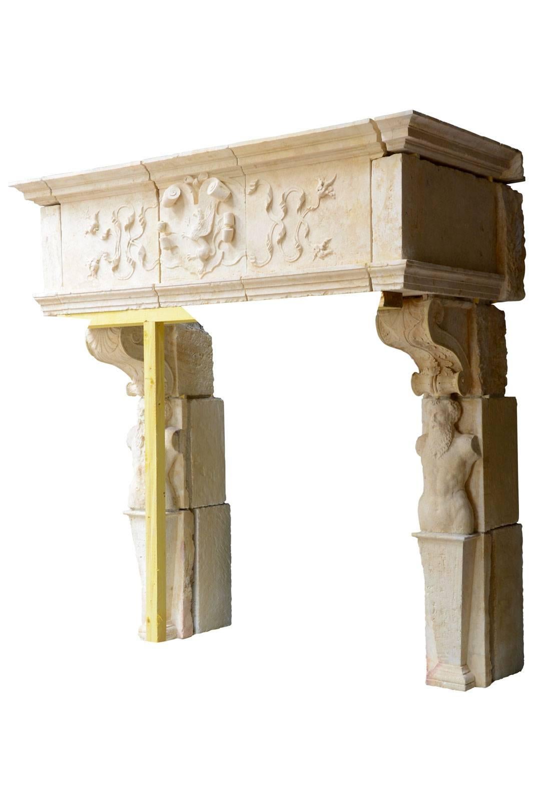 Dating from the mid-16th century, exceptional Renaissance Bourgogne stone fireplace. The monolith lintel is decorated with a median cut leather cartridge featuring a griffin, recognizable by its eagle's head and lion's body, flanked by foliage.The