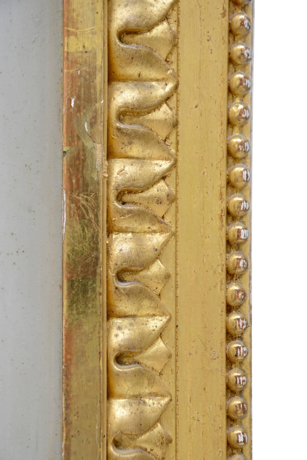 French Louis XVI Style Gilded Wood and Lacquered Grey Trumeau, 19th Century For Sale