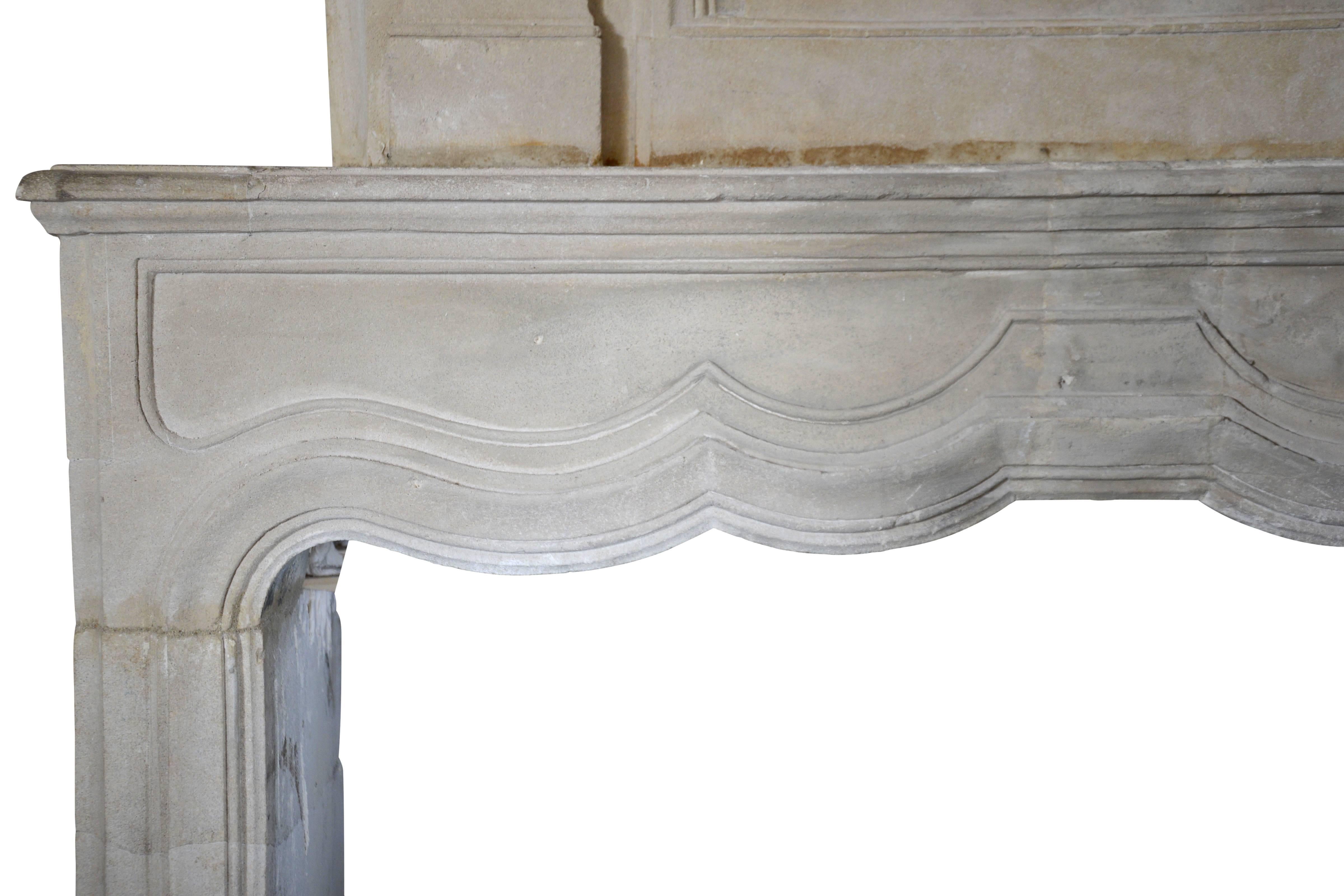 Carved Louis XIV Period Burgundy Stone Fireplace, 18th Century For Sale