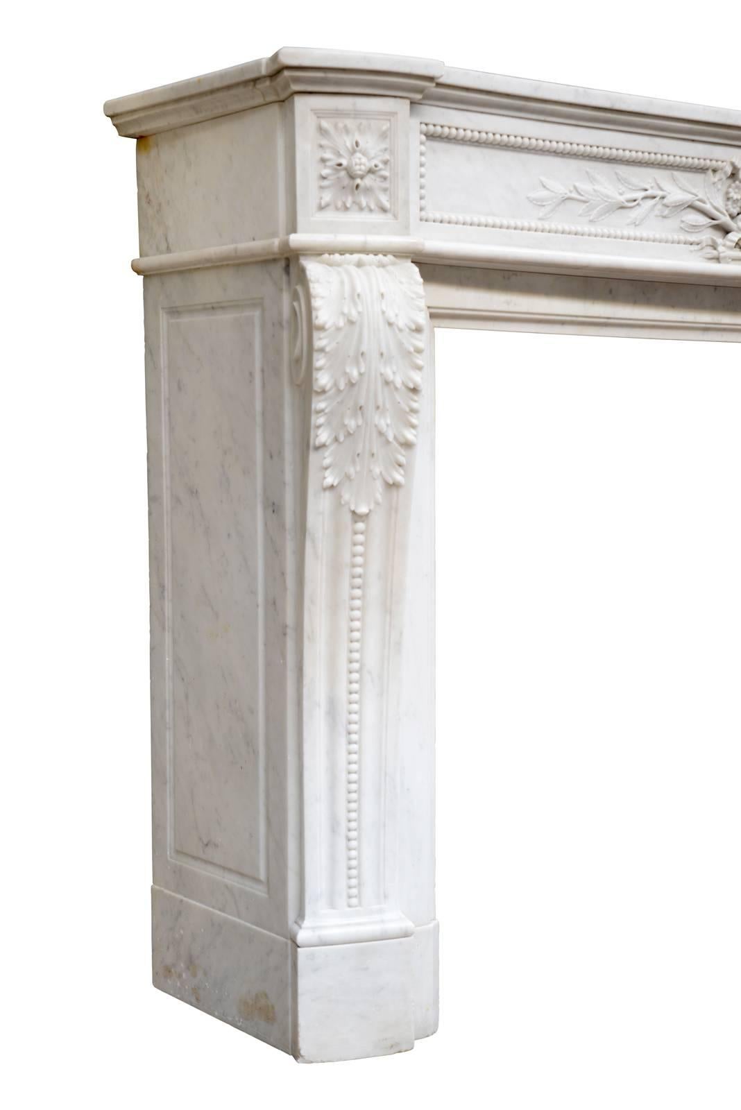 Carved French Louis the 16th Style White Carrara Marble Fireplace, 19th Century For Sale