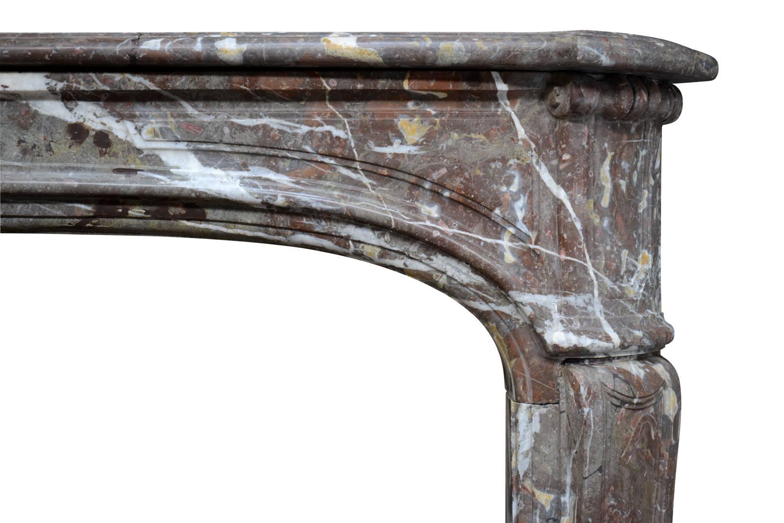 Carved Louis XIV Royal Red Hautmont Marble Fireplace, 18th Century For Sale