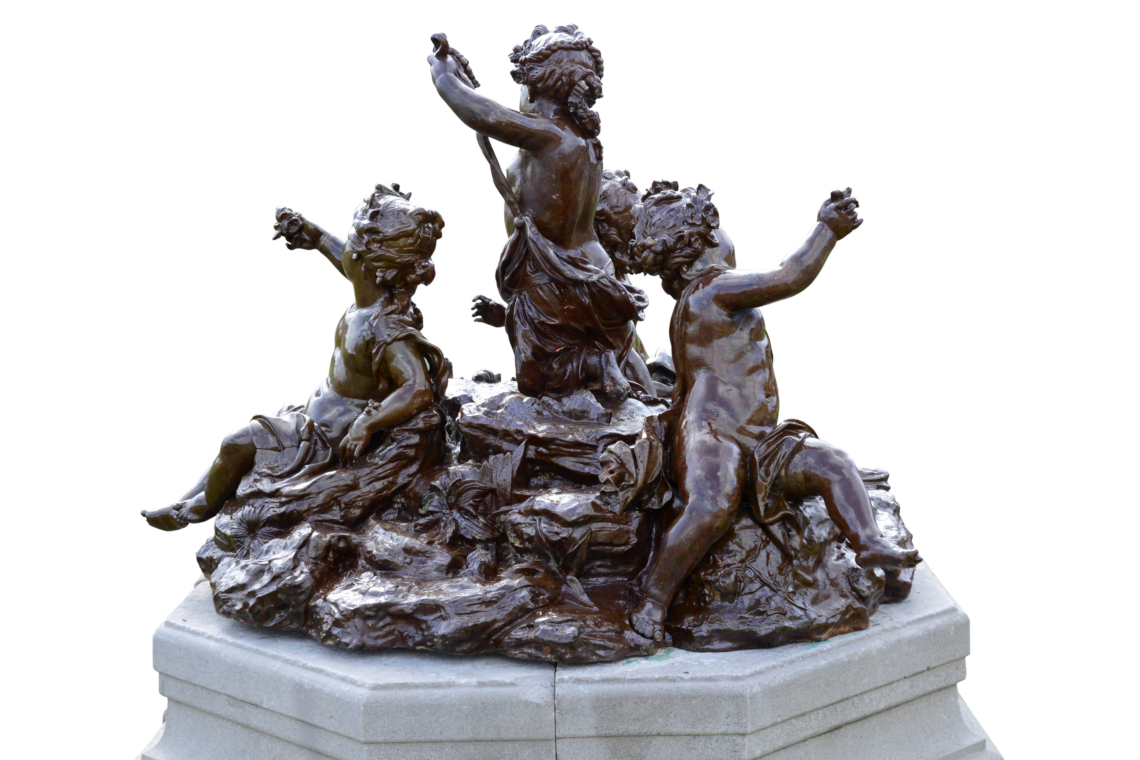Important Cast Iron Group of Puttti Resting on a Granite Pedestal, 19th Century 3