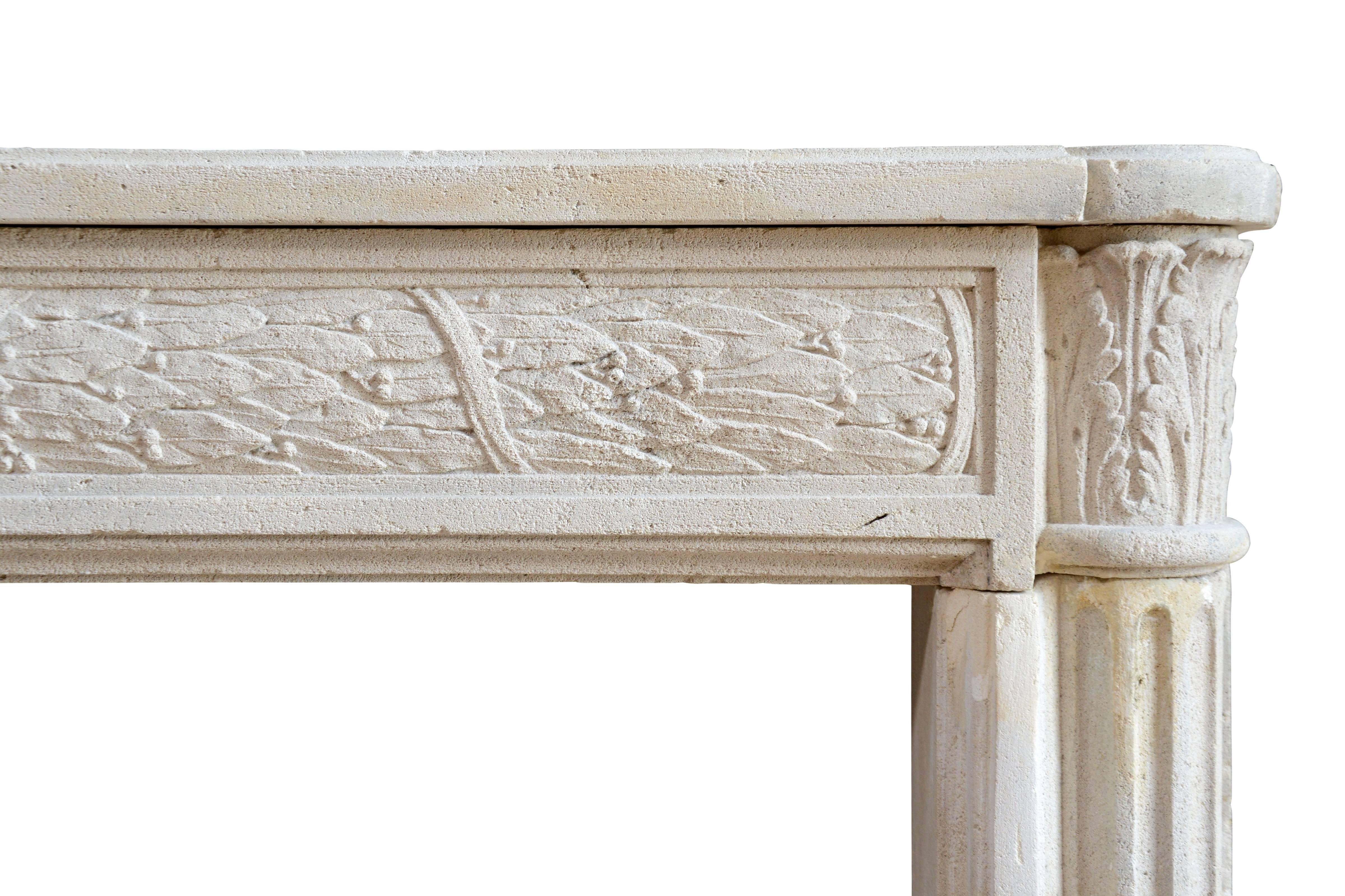 Carved Louis XVI Period Stone Fireplace, 18th Century