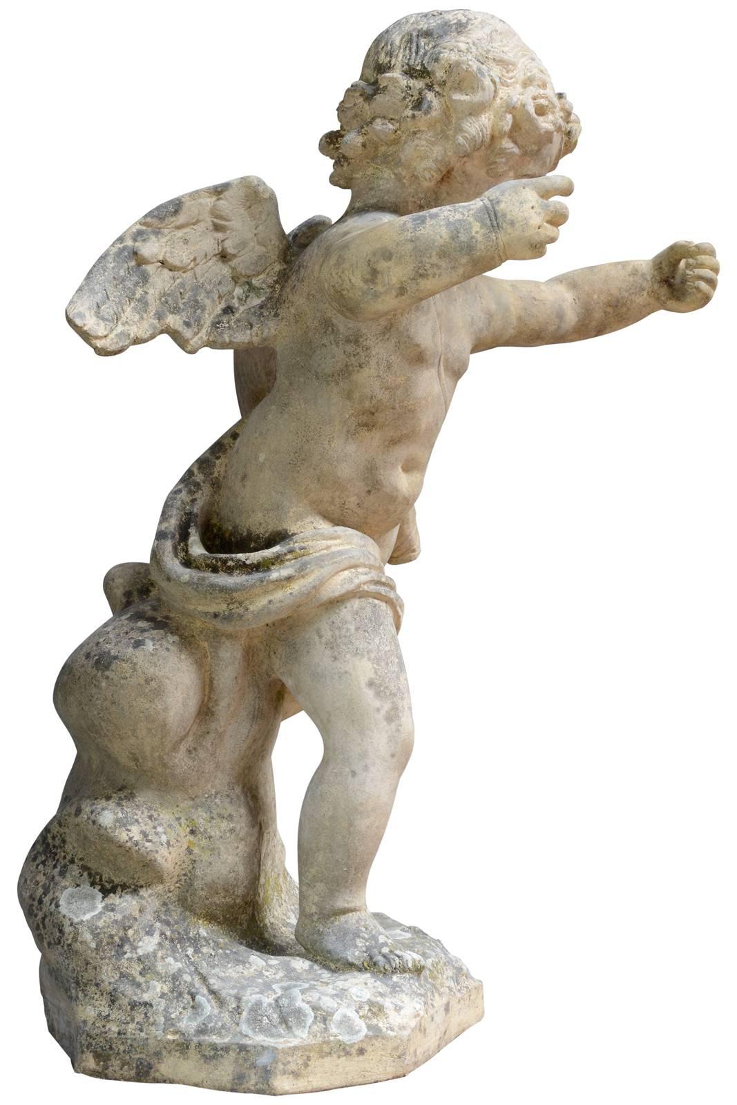 Statue of cupid, terracotta dating from the 19th century. Finely carved, this statue presents a putti in the position of an archer, possessing as a attribute a quiver.

Cupid, the son of Venus, is in Roman mythology the god of Love. Its attributes