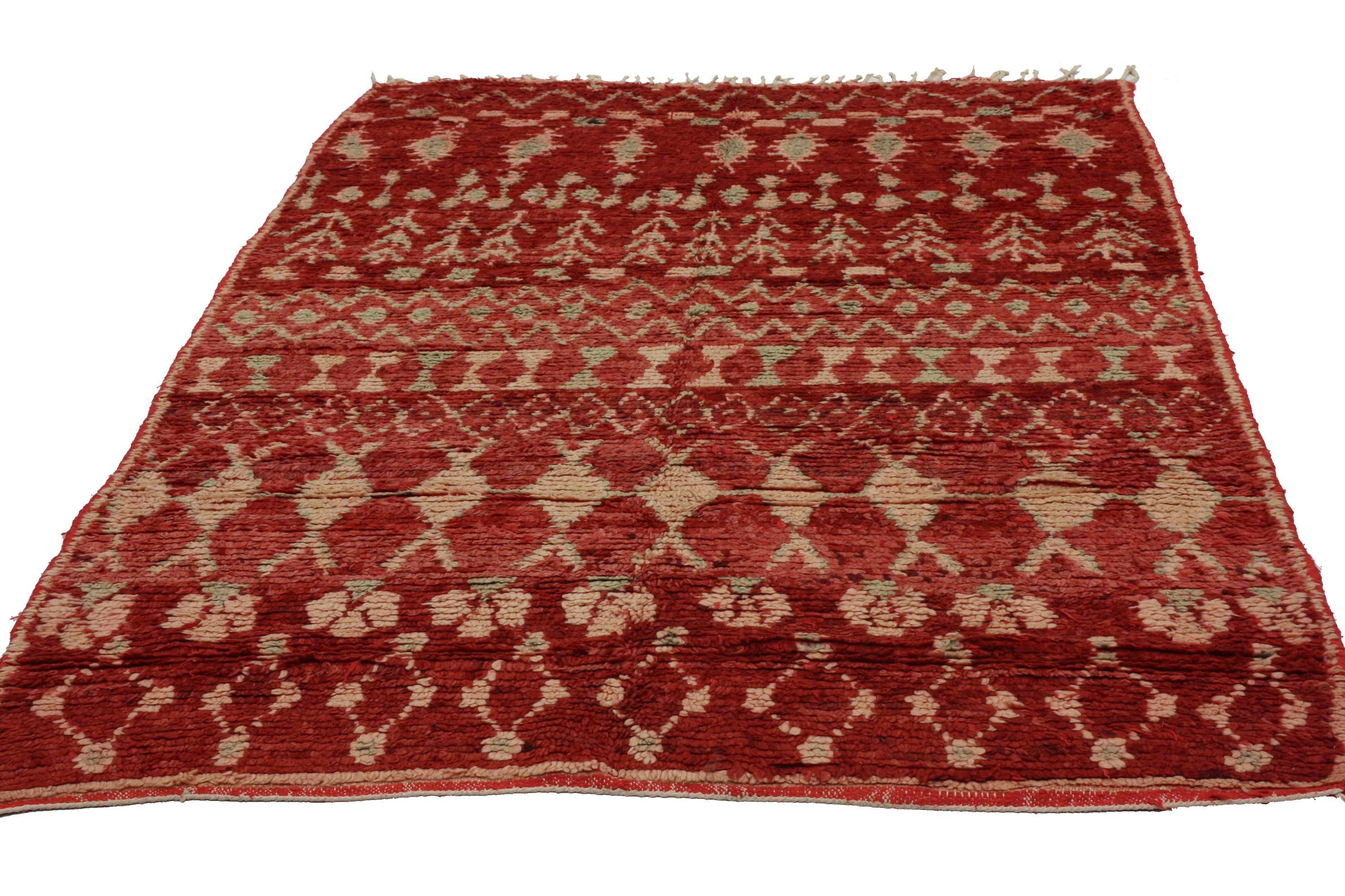 With the dramatic red color and plush pile of this Berber Moroccan rug, you can have your own red carpet moment anytime. Sizzling red hot or seductively sedate, the color red is not for the timid. Unlock the secrets with this striking, Berber