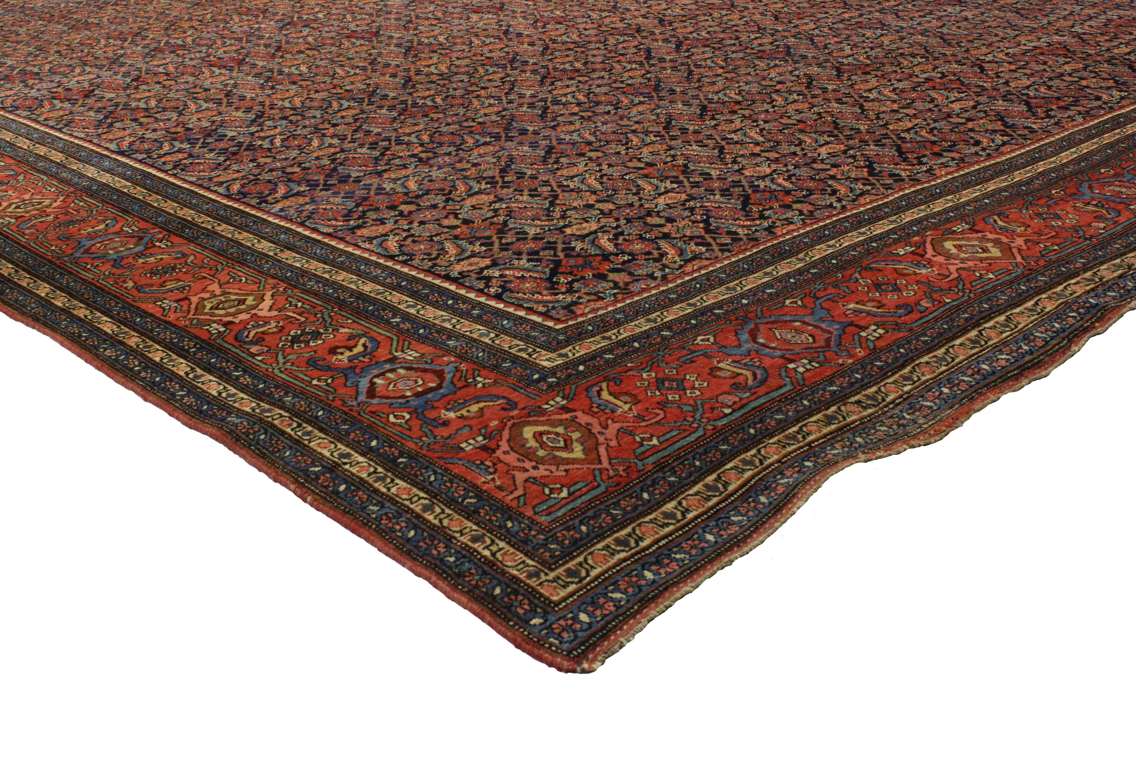 76785 Late 19th Century Antique Persian Bijar Rug, 13'00 x 22'08. Woven in the rugged mountains of western Iran during the final decades of the 19th century, this rare and regal antique Persian Bijar rug is a majestic relic of resilience,