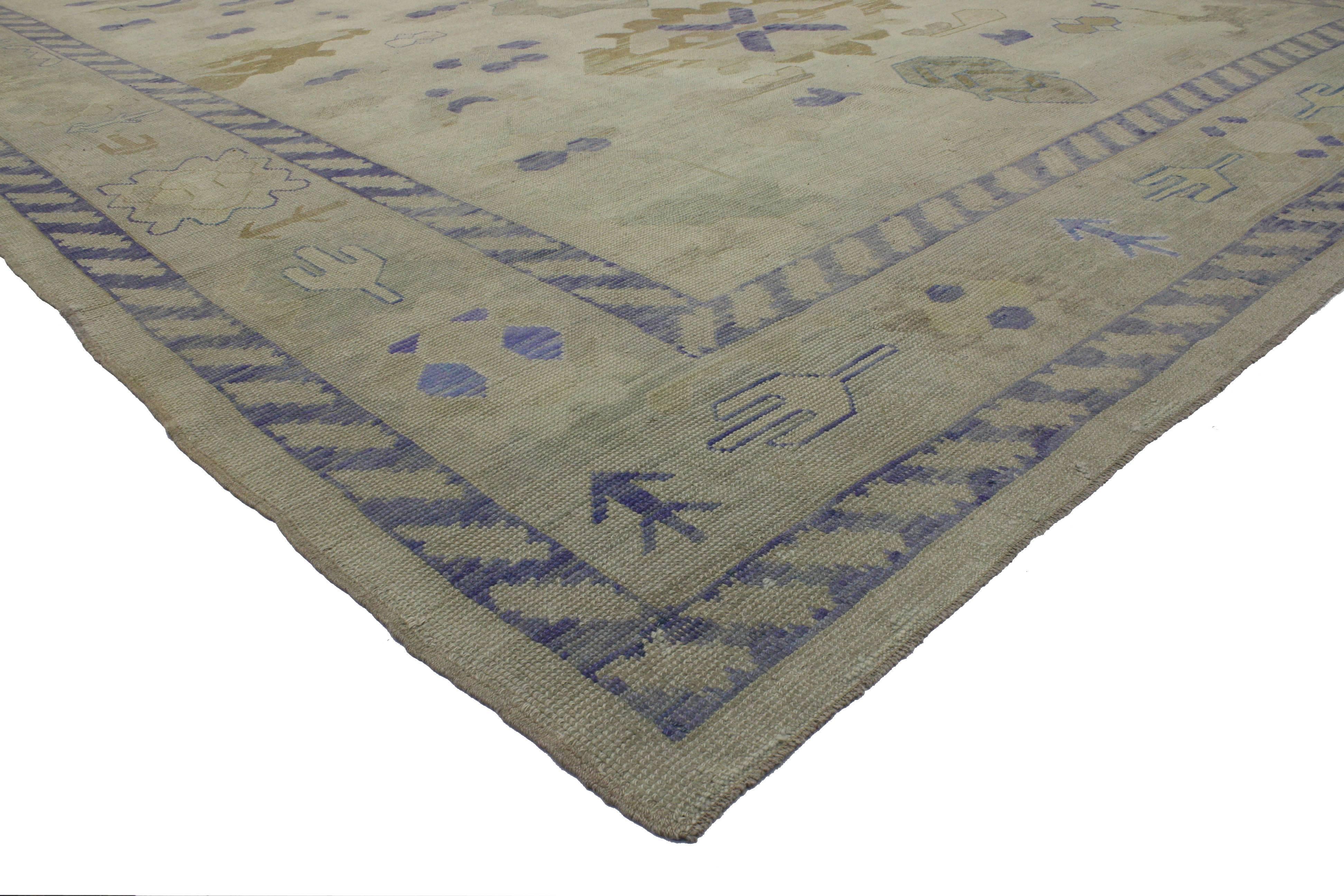 With a Classic design and transitional style, this modern Turkish Oushak rug with transitional style in coastal colors keeps the eyes entertained, but it is still serene and relaxing. This transitional rug has such an elegant feel the beige color