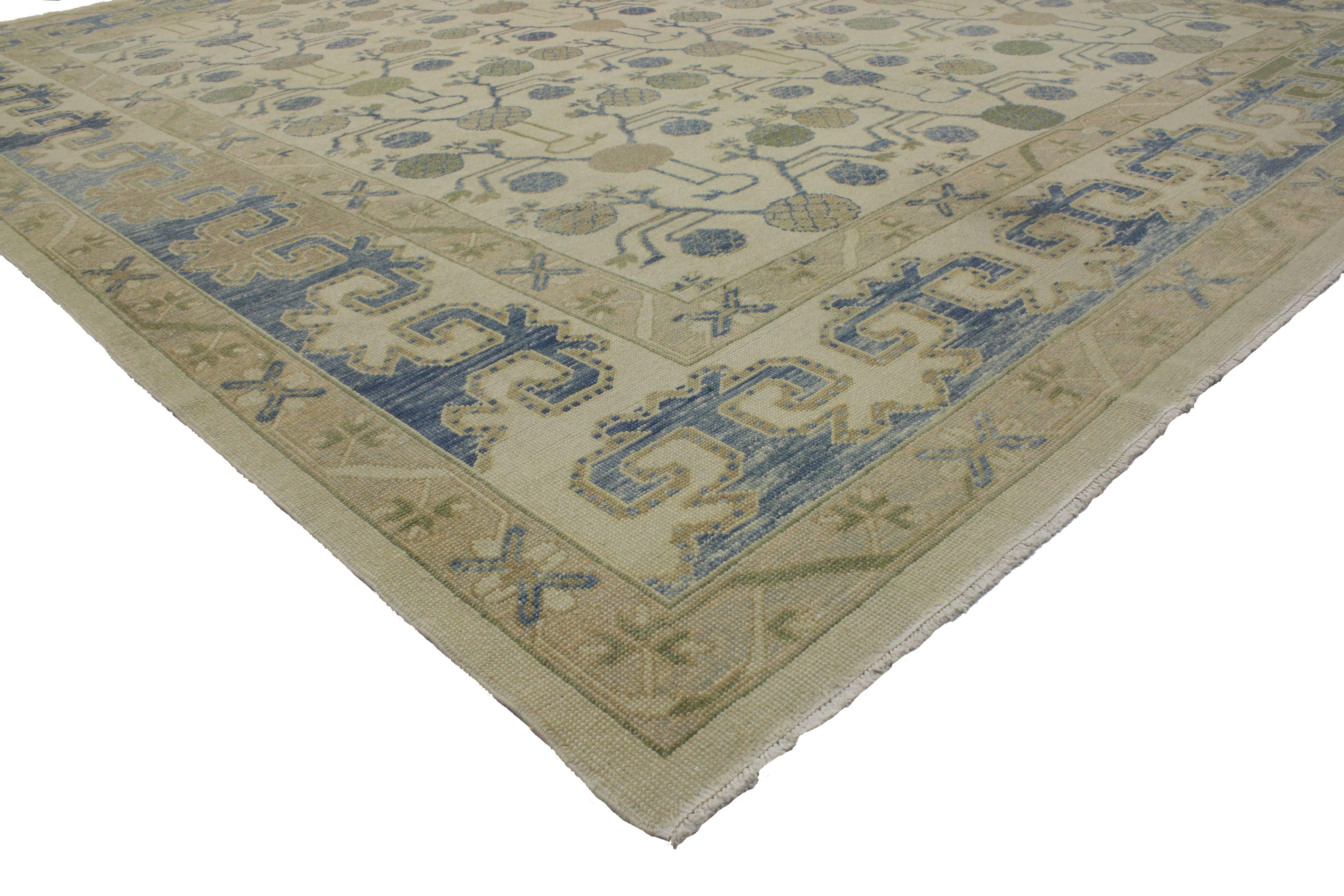 This modern Turkish Oushak rug features a transitional style and Khotan design. Providing an element of comfort, artistic statement and functional versatility, this Oushak rug creates a quiet sophistication and soothing elegance. With its unique