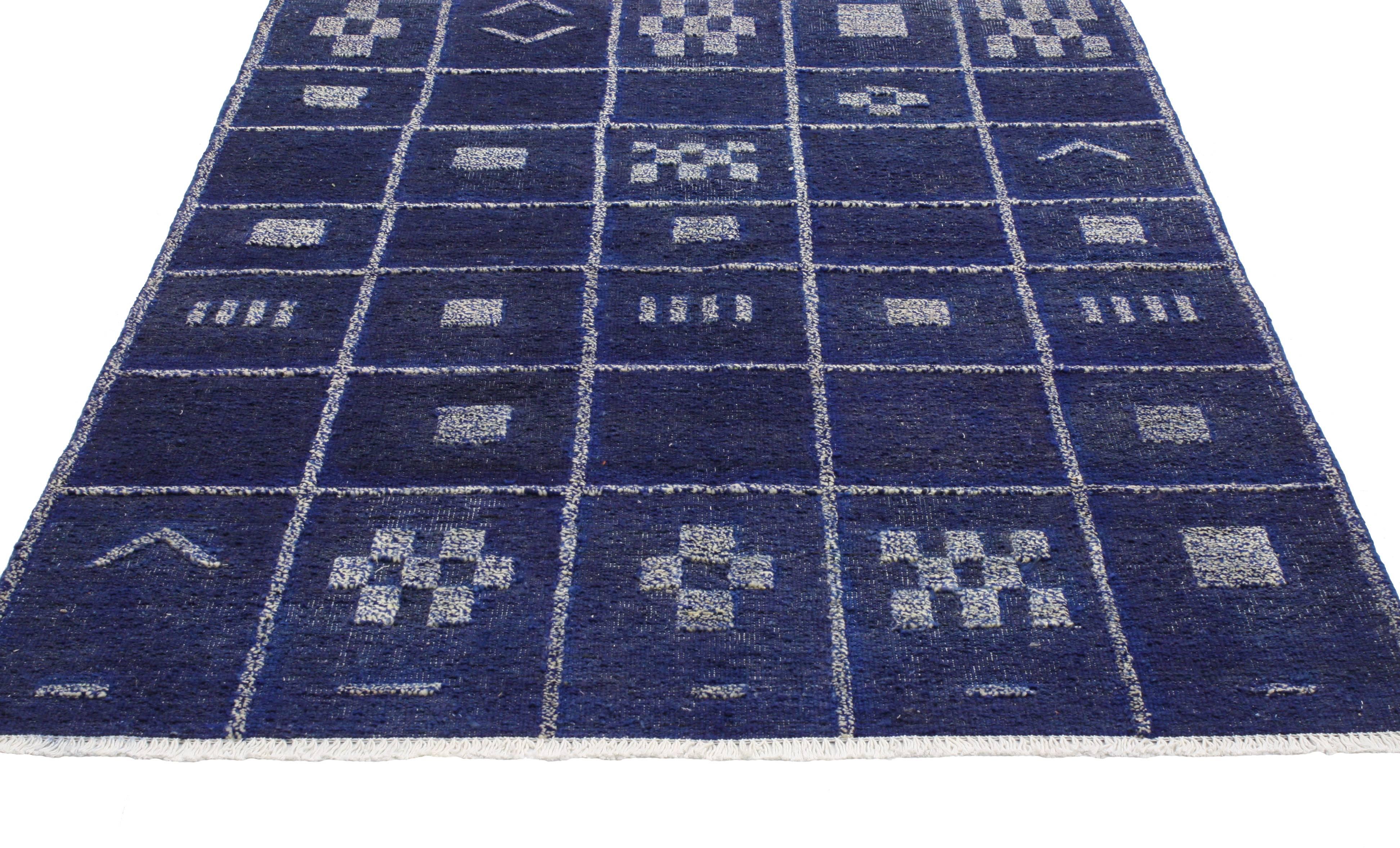 80281 Contemporary Moroccan Style Rug in Cobalt Blue High Low Pile, Two Layer Rug. Saturated in an extraordinary palette of cobalt blue, this Moroccan style rug showcases true simplistic style with a punch of color. The geometric motifs and linear