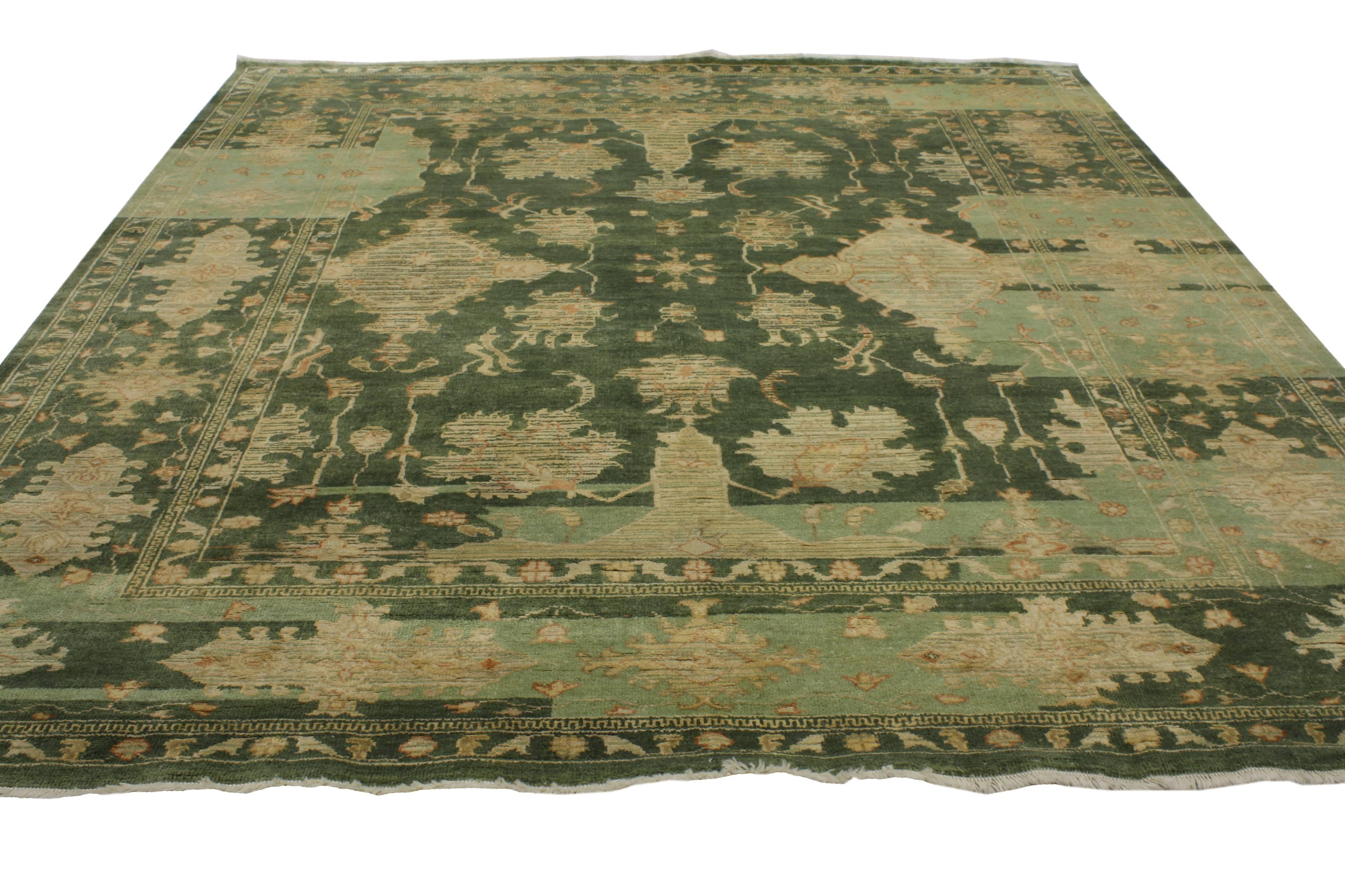 Add character to your space with the look of age in this contemporary green Oushak style rug featuring a modern traditional style. The beauty of this artificially worn finish is very forgiving and it can add charm and a sense of history to the home,